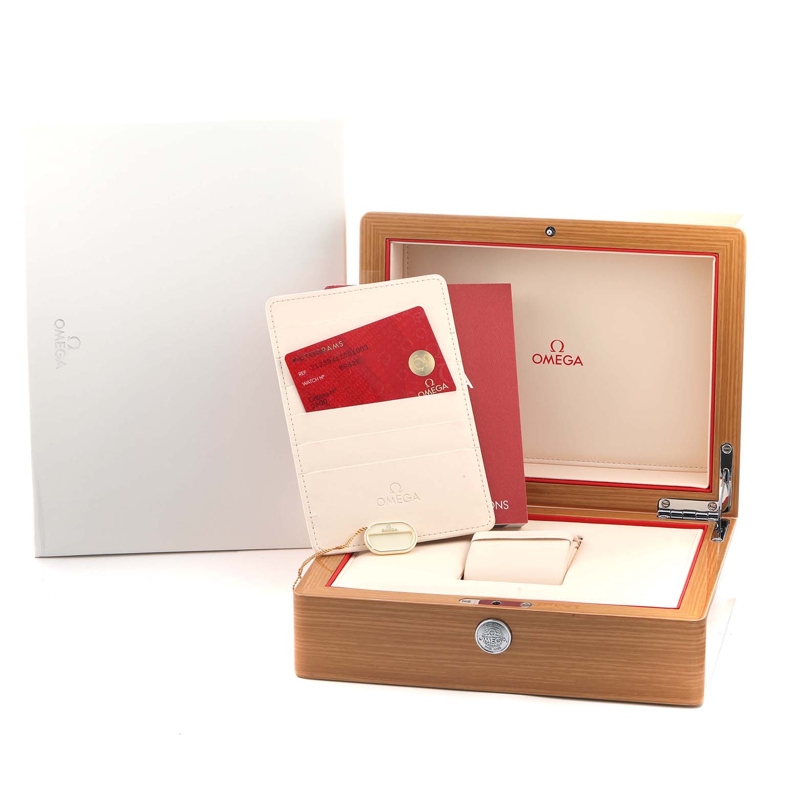 The image shows an Omega Seamaster 212.30.41.20.01.003 Men
s Stainless Steel Black Dial watch box, warranty card holder, and booklets, all neatly arranged.