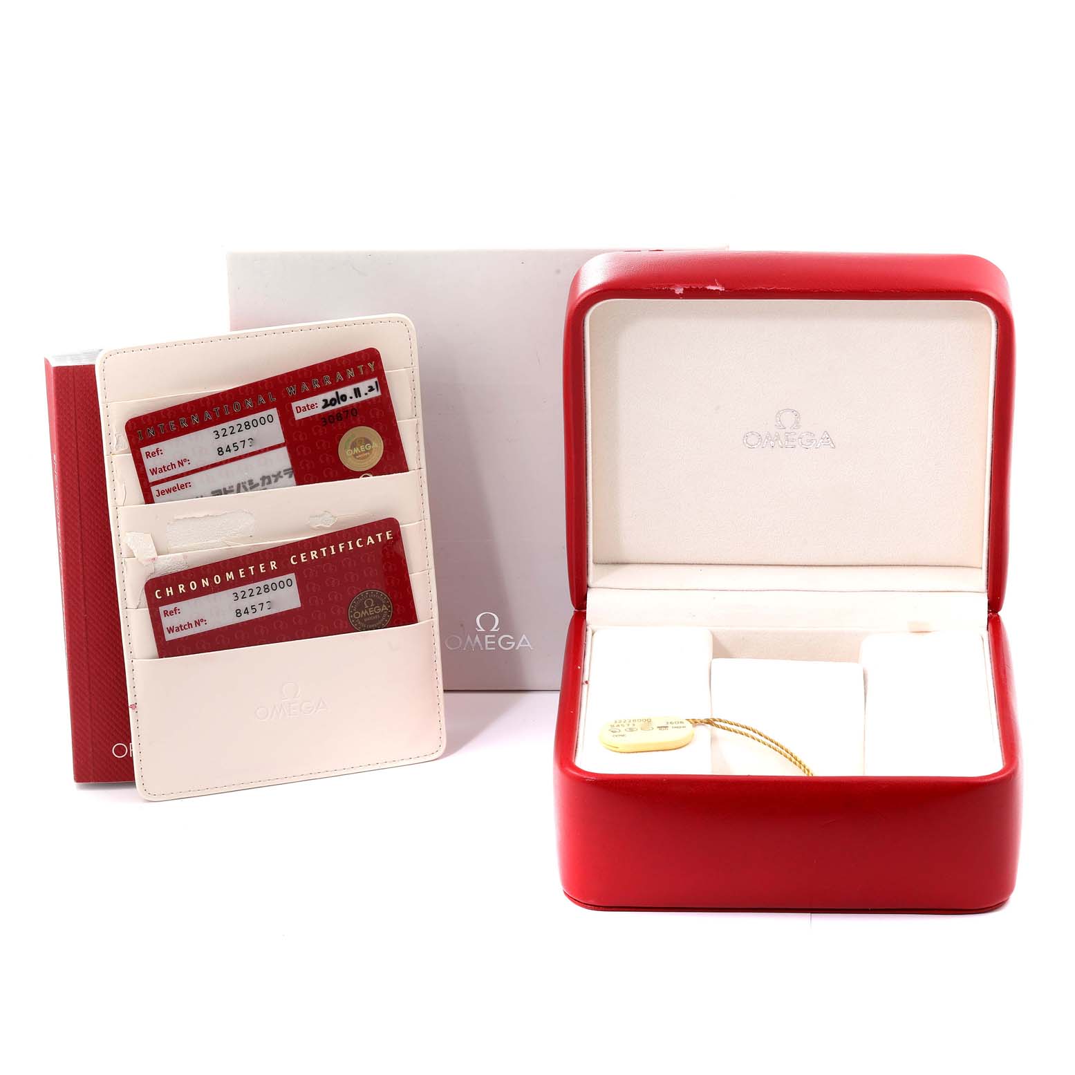 The image shows an Omega Speedmaster 3222.80.00 Men's Stainless Steel Blue Dial 3222.80.00 Men's Stainless Steel Blue Dial model box, warranty cards, and a certificate booklet from a front angle.