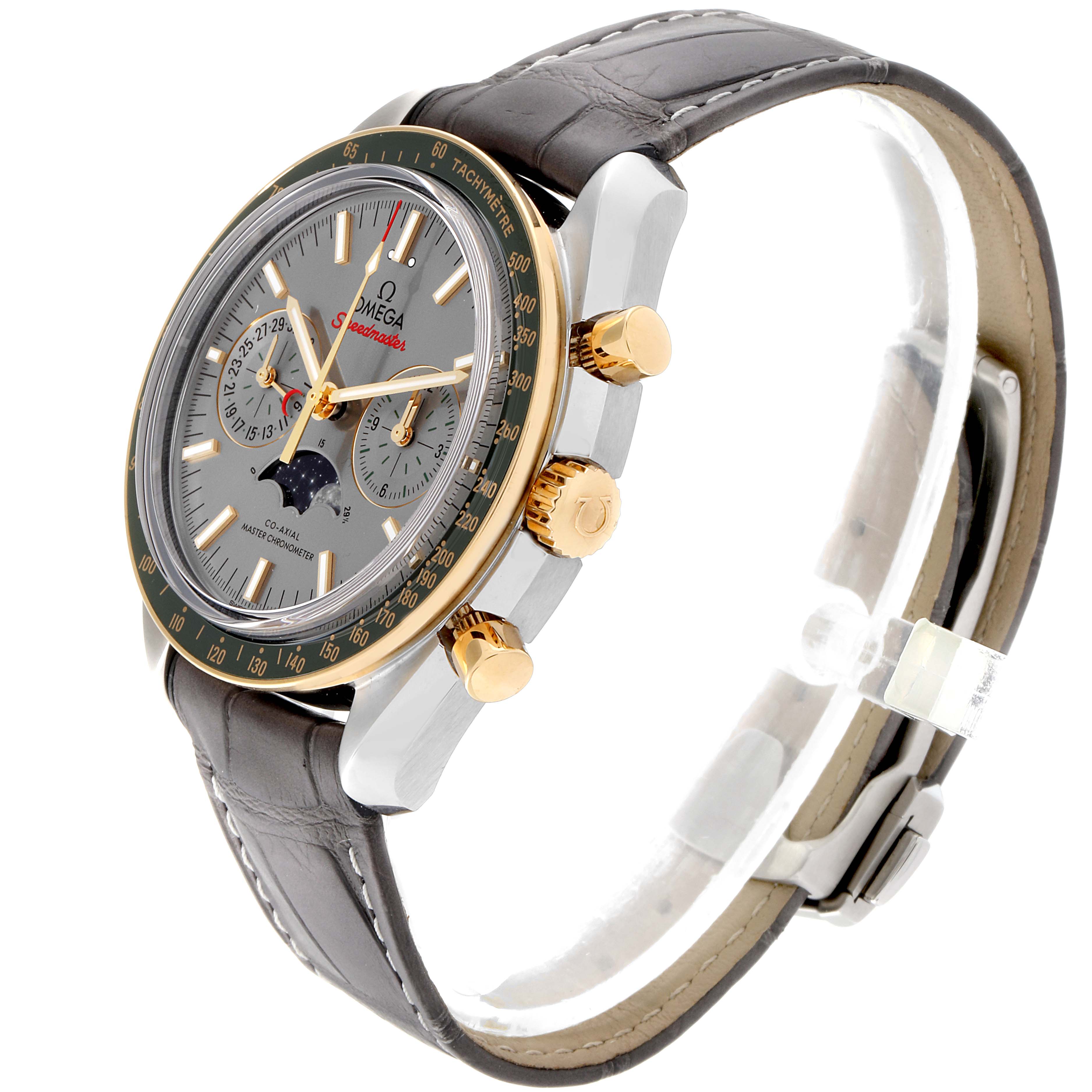 The image shows an Omega Speedmaster 304.23.44.52.06.001 Men's Steel and Gold (two tone) Grey Dial 304.23.44.52.06.001 Men's Steel and Gold (two tone) Grey Dial watch at an angle highlighting the face, crown, pushers, and leather strap.