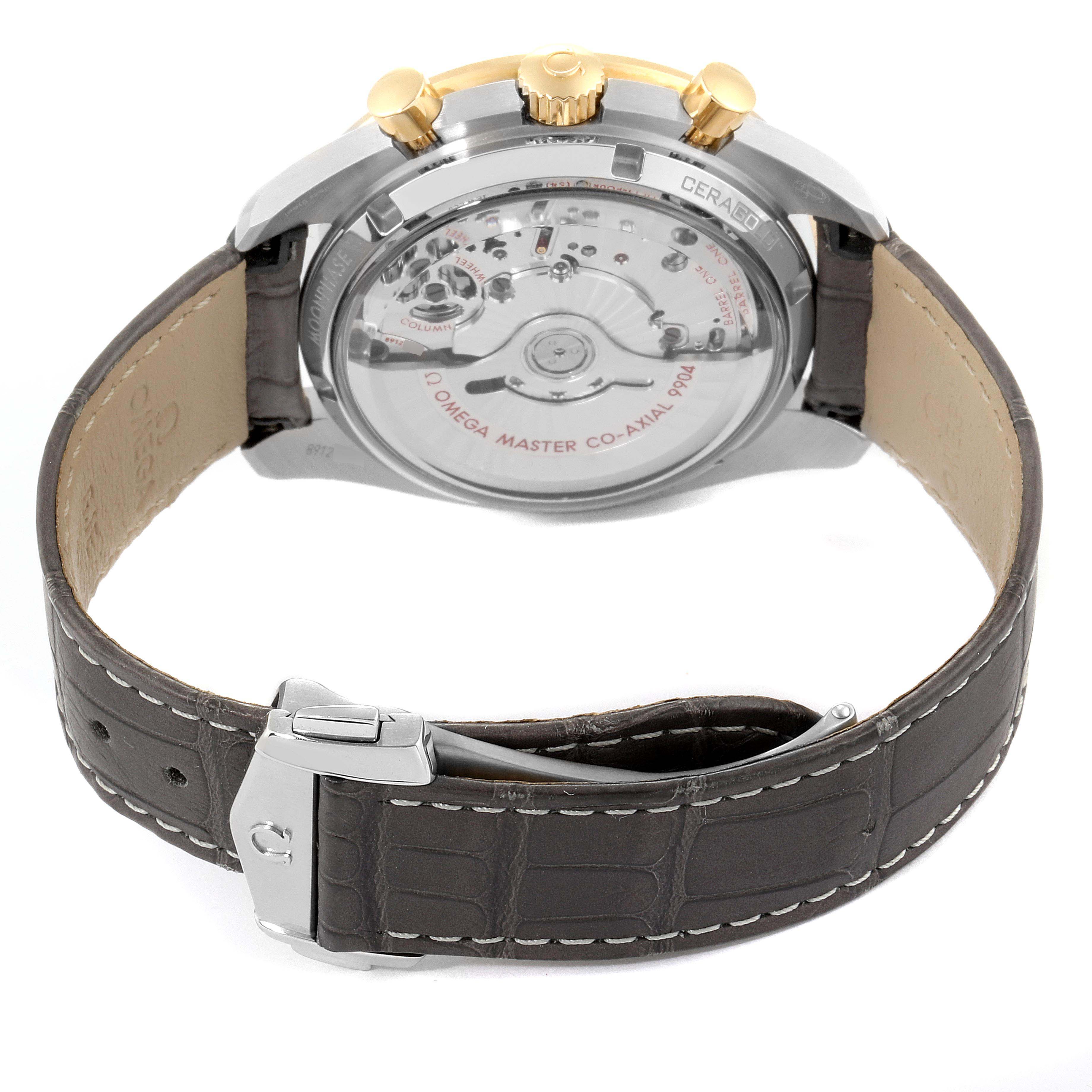 The image shows the back view of an Omega Speedmaster 304.23.44.52.06.001 Men's Steel and Gold (two tone) Grey Dial 304.23.44.52.06.001 Men's Steel and Gold (two tone) Grey Dial watch, highlighting the transparent case back and leather strap.