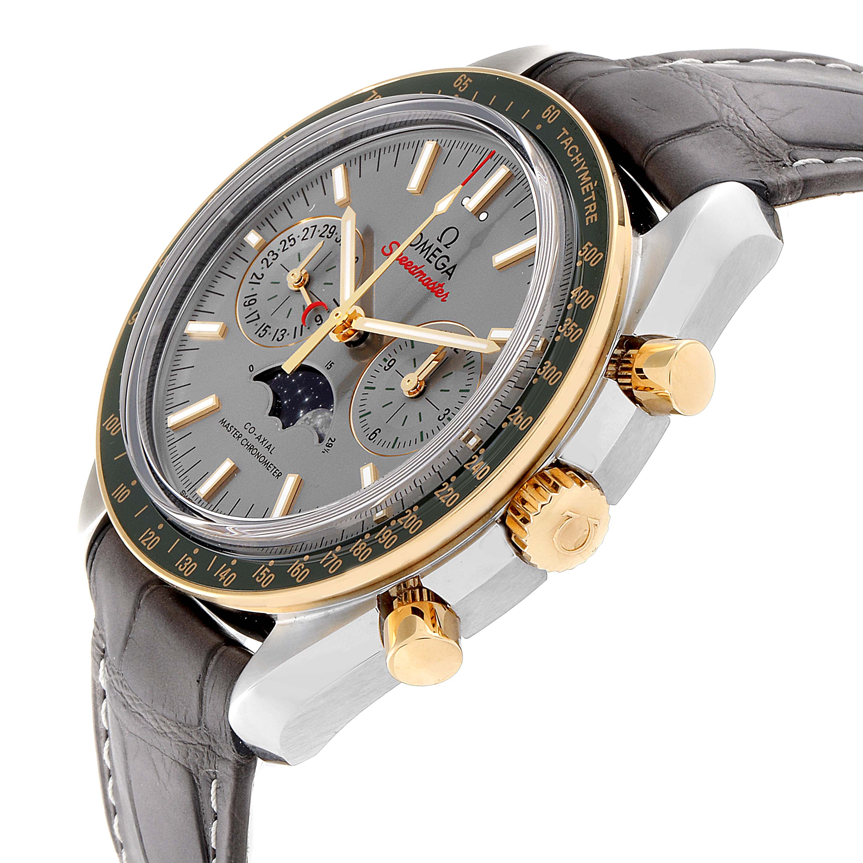 The image shows an Omega Speedmaster 304.23.44.52.06.001 Men's Steel and Gold (two tone) Grey Dial 304.23.44.52.06.001 Men's Steel and Gold (two tone) Grey Dial watch at a slight angle, highlighting the face, bezel, crown, pushers, and leather strap.