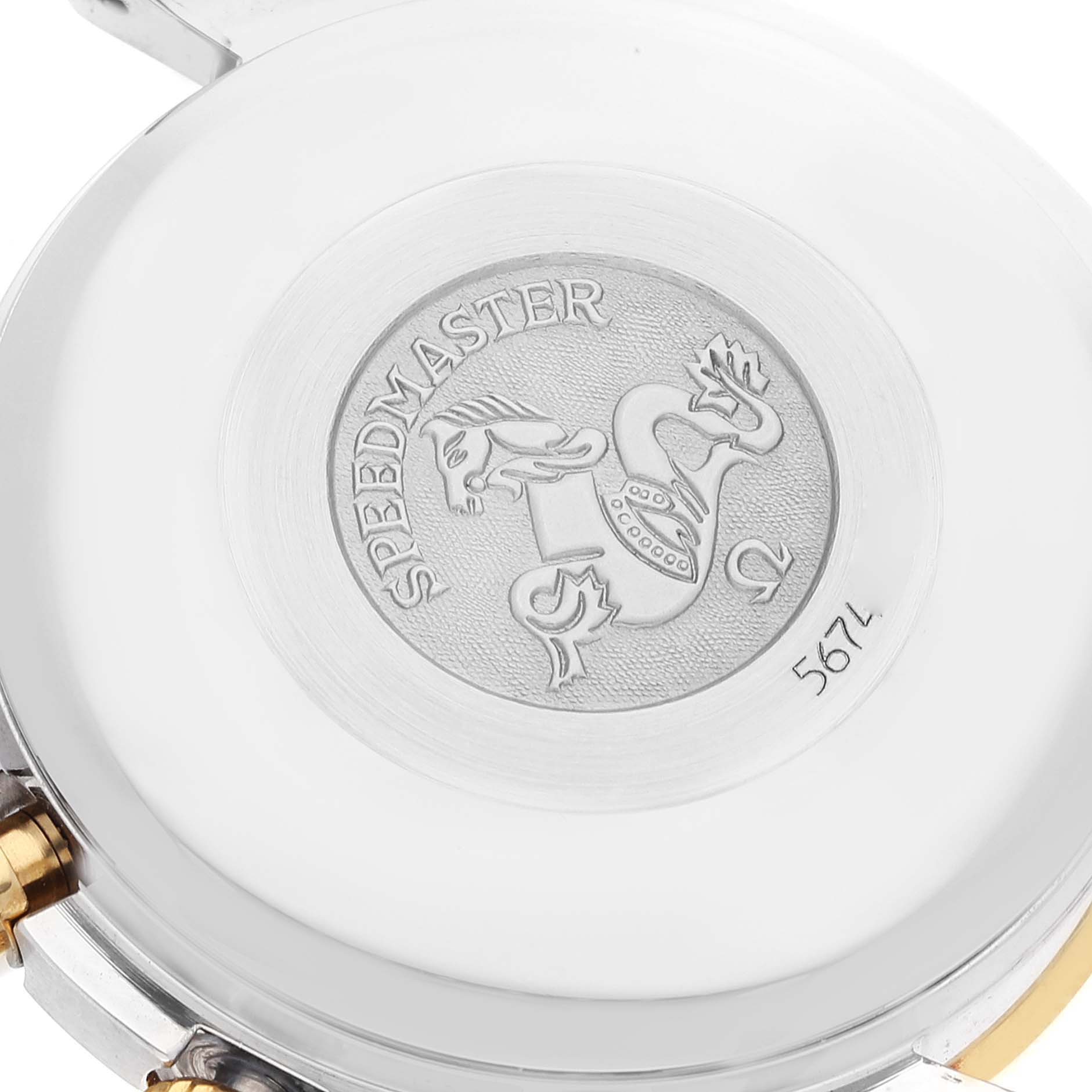 The image shows the engraved backside of an Omega Speedmaster 3313.30.00 Men's Steel and Gold (two tone) Silver Dial 3313.30.00 Men's Steel and Gold (two tone) Silver Dial watch with the model name and emblem.