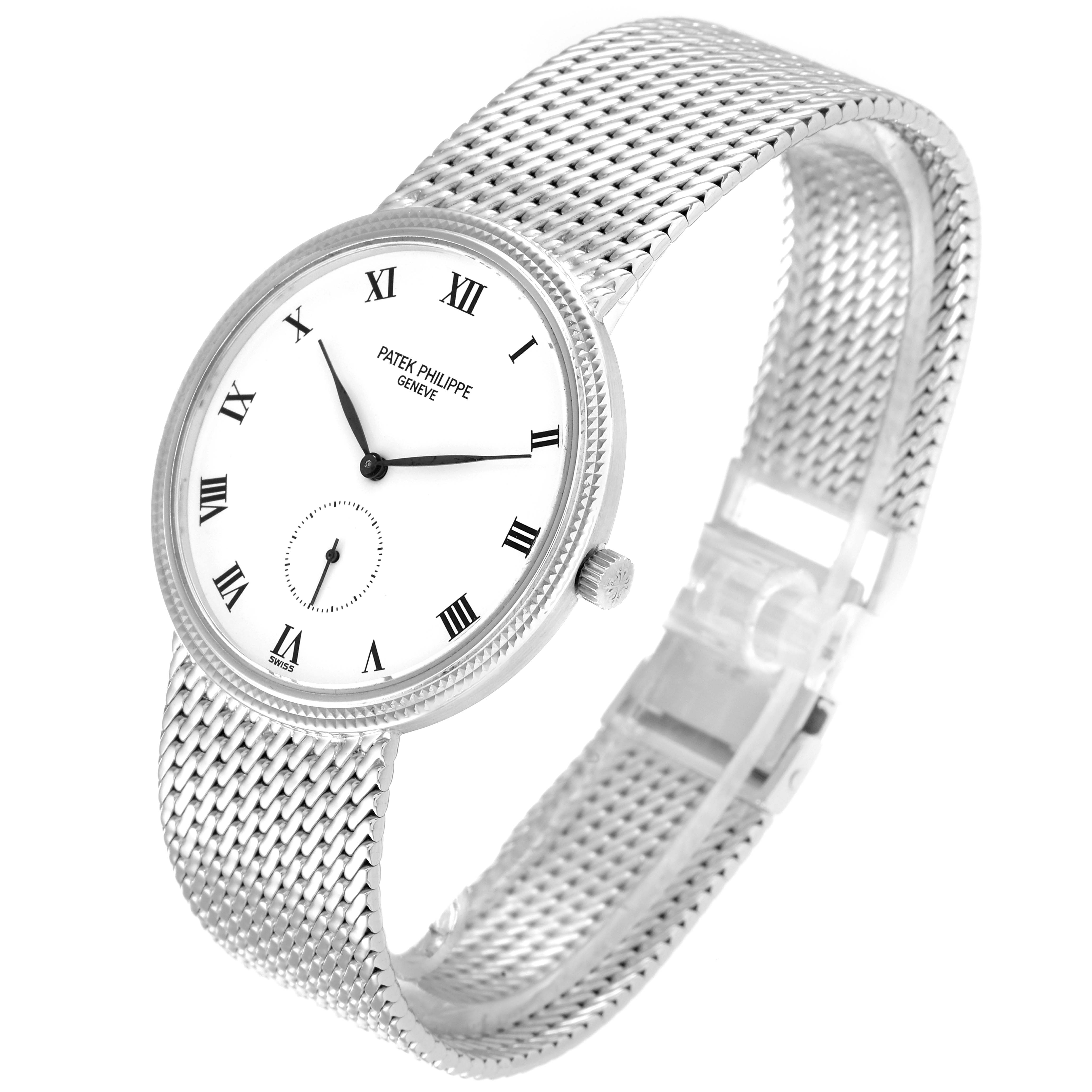 The image shows a side-angle view of the Patek Philippe Calatrava 3919G Men's White Gold White Dial 3919G Men's White Gold White Dial watch, highlighting its mesh strap and Roman numeral dial.