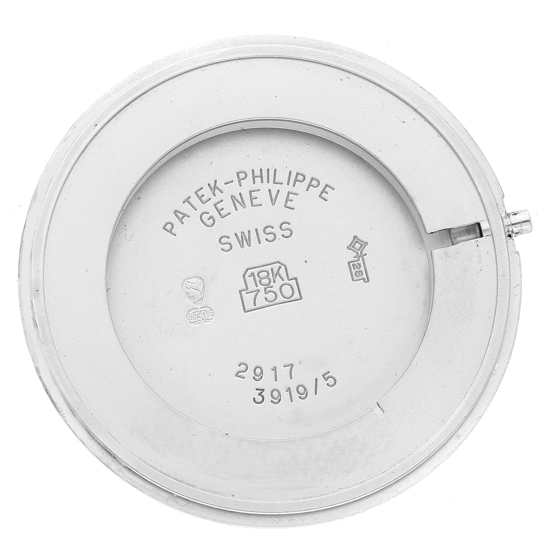 The image shows the inner case back of a Patek Philippe Calatrava 3919G Men's White Gold White Dial 3919G Men's White Gold White Dial model watch, displaying hallmark engravings.