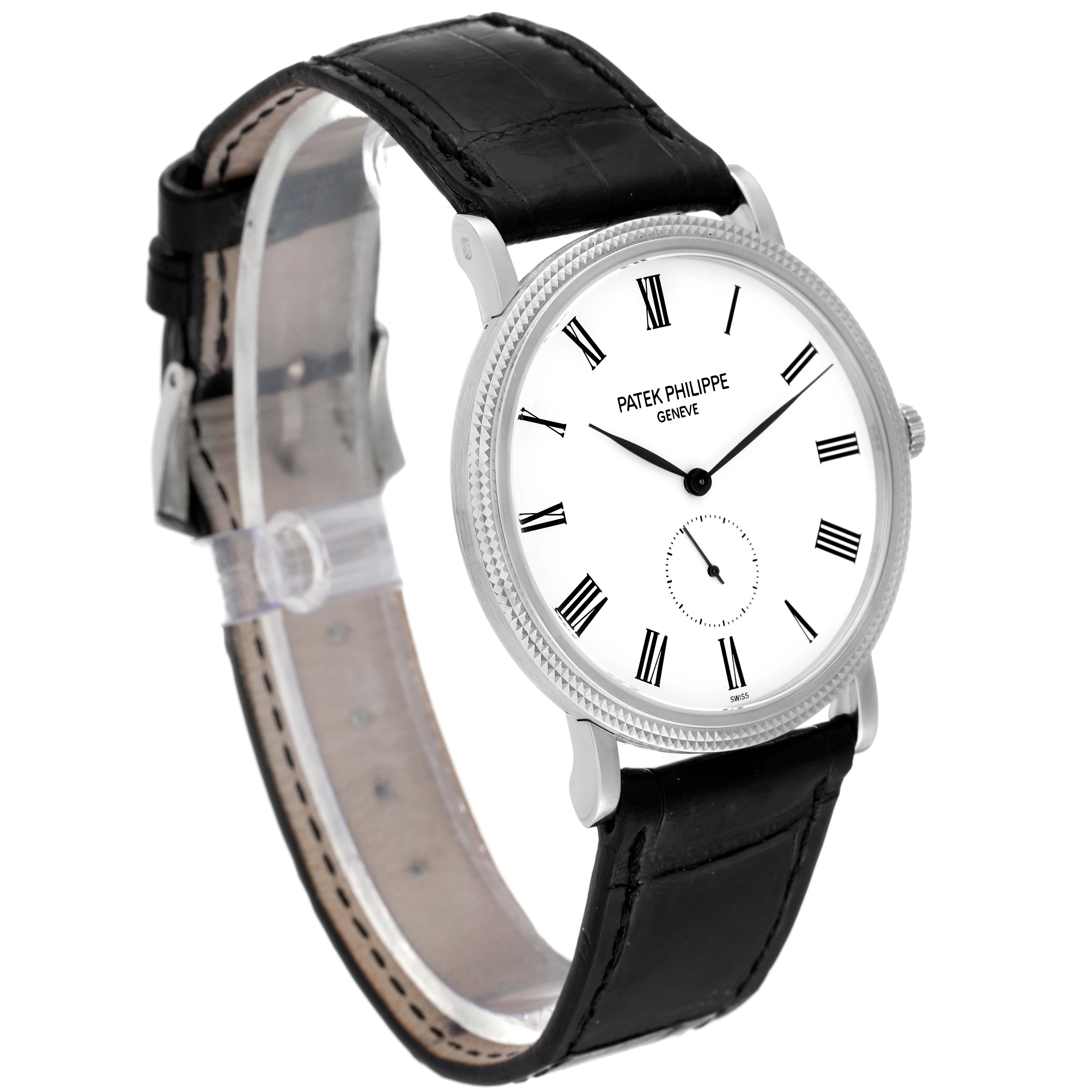 The image shows a Patek Philippe Calatrava 5119G Men
s White Gold White Dial 5119G Men
s White Gold White Dial watch at an angled side view, highlighting the dial, bezel, and leather strap.