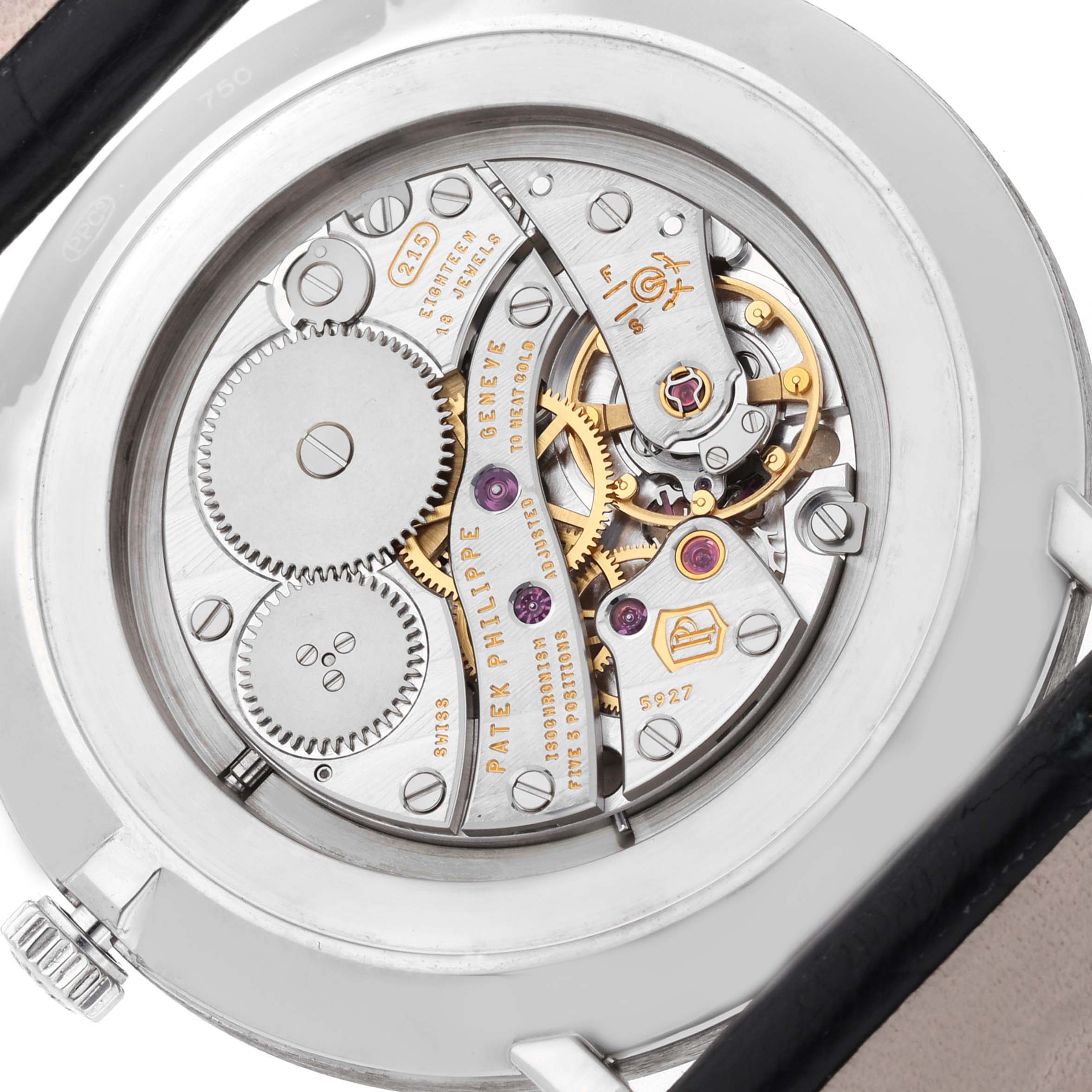 This image shows the back view of a Patek Philippe Calatrava 5119G-001 Men's White Gold White Dial 5119G-001 Men's White Gold White Dial, highlighting its intricate mechanical movement.