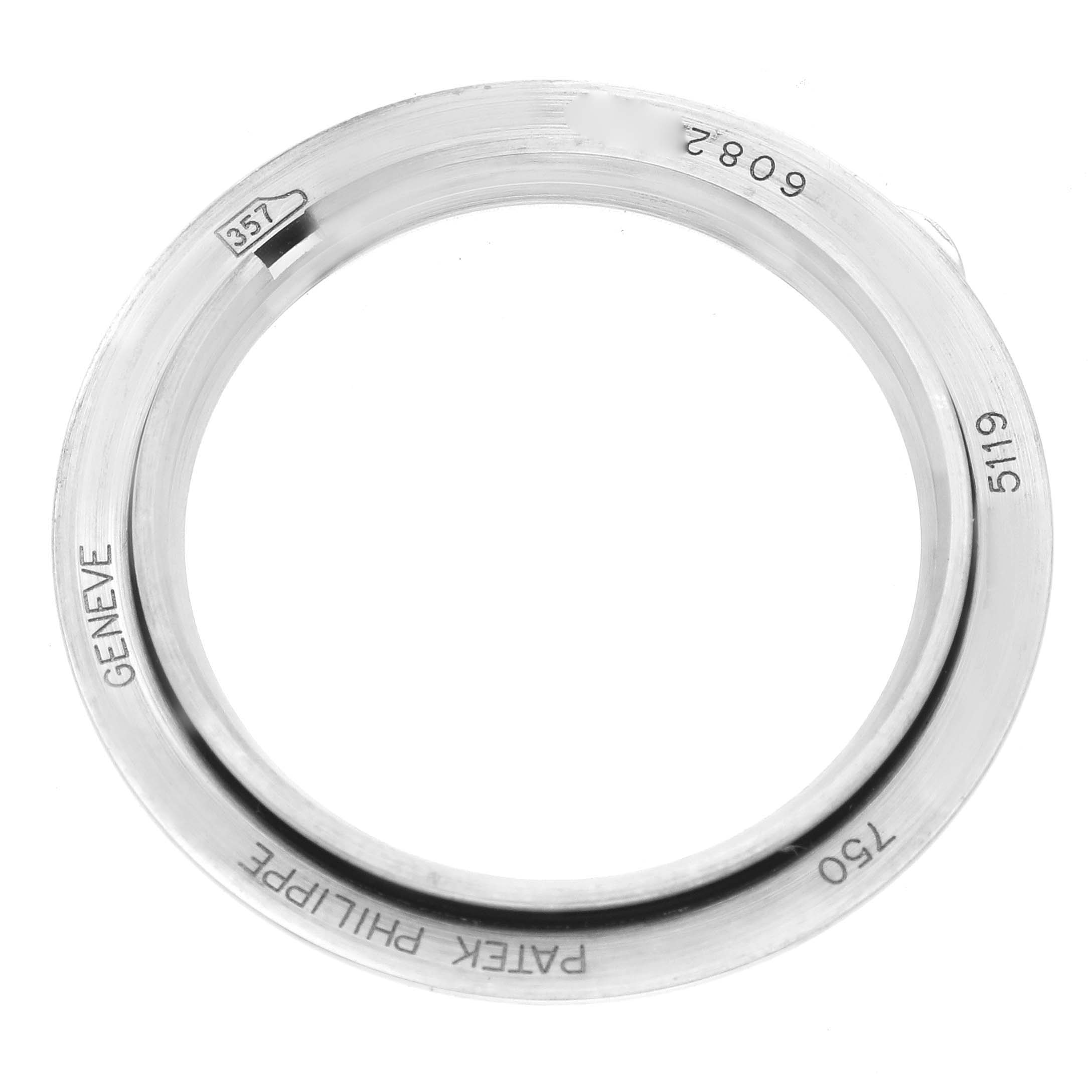 The image shows a Patek Philippe Calatrava 5119G-001 Men's White Gold White Dial 5119G-001 Men's White Gold White Dial watch bezel viewed from above.