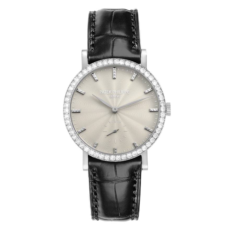 The Patek Philippe Calatrava 7120G-001 Women's White Gold Beige Dial watch is shown from the front, featuring a diamond bezel, silver dial, and black leather strap.
