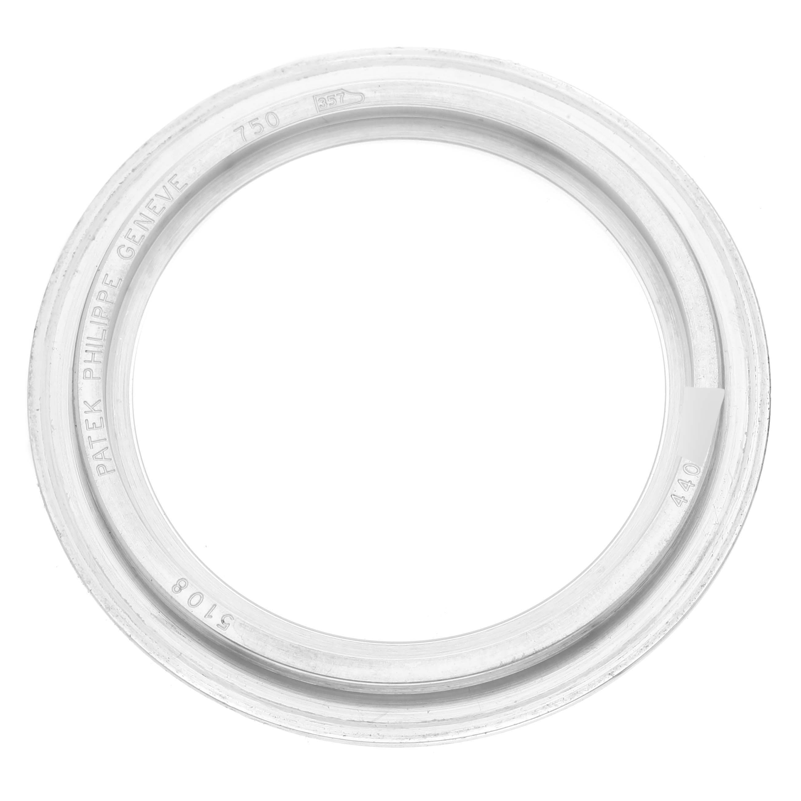 The image shows a top-down view of a bezel ring from a Patek Philippe Calatrava 5108G-010 Men's White Gold Black Dial 5108G-010 Men's White Gold Black Dial watch.