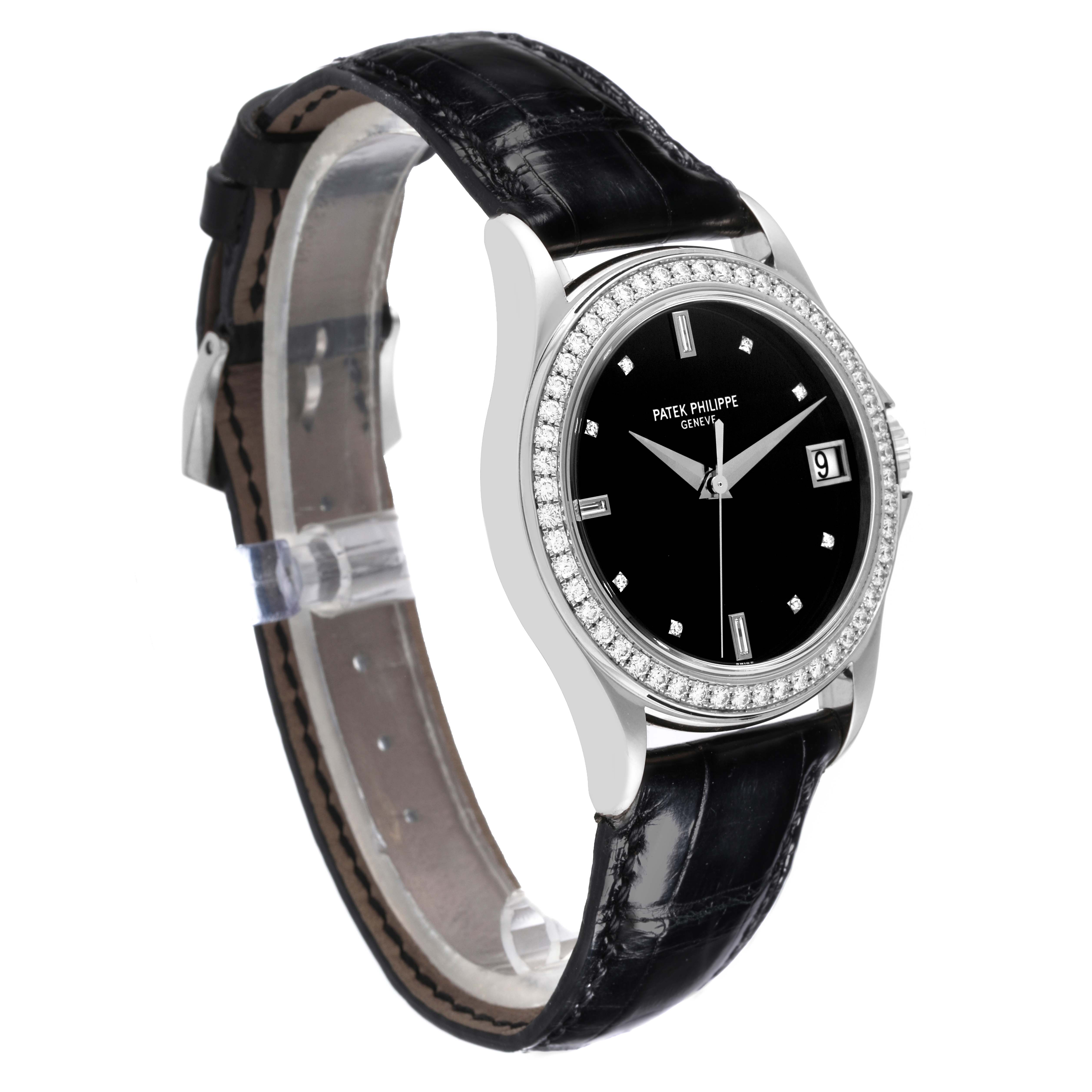 The Patek Philippe Calatrava 5108G-010 Men's White Gold Black Dial 5108G-010 Men's White Gold Black Dial watch is shown at a slight angle, displaying the face, bezel, and leather strap.