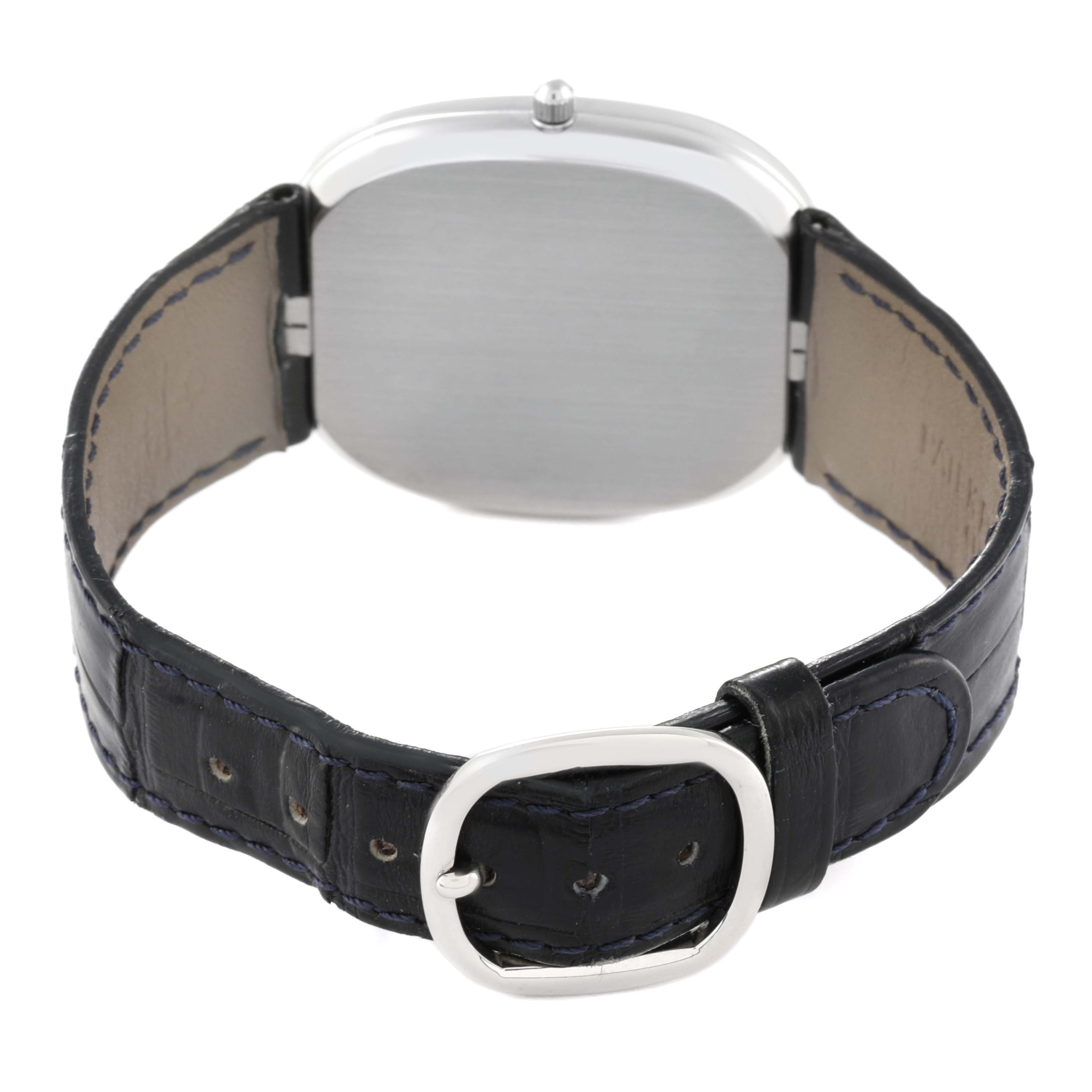 The image shows the back and strap of a Golden Ellipse model by Patek Philippe.