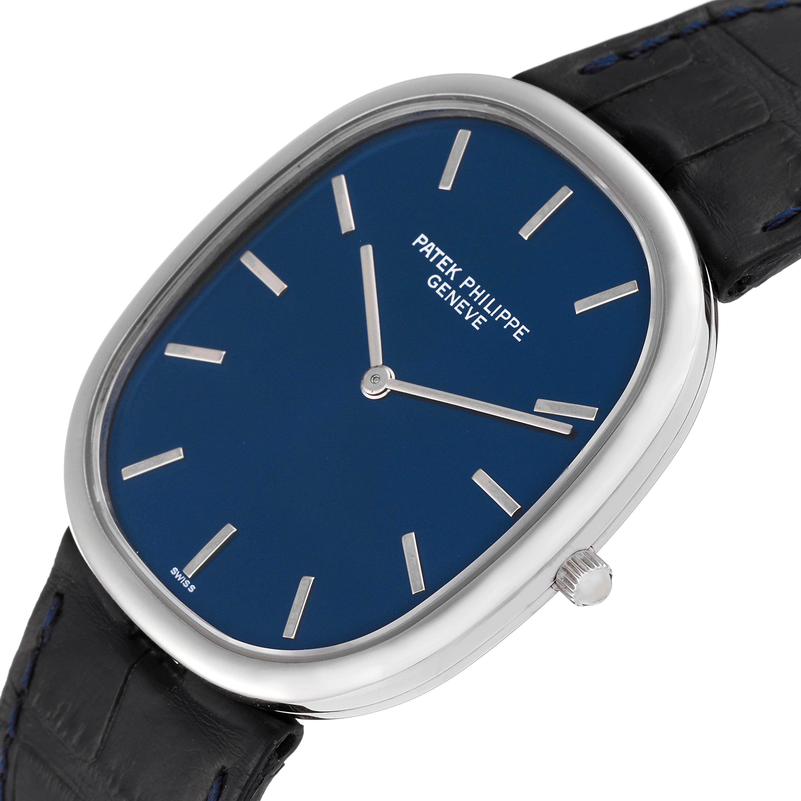 The image shows the Patek Philippe Golden Ellipse 5738P-001 Men's Platinum Blue Dial 5738P-001 Men's Platinum Blue Dial watch from a front angle, highlighting the face, hands, case, and part of the strap.