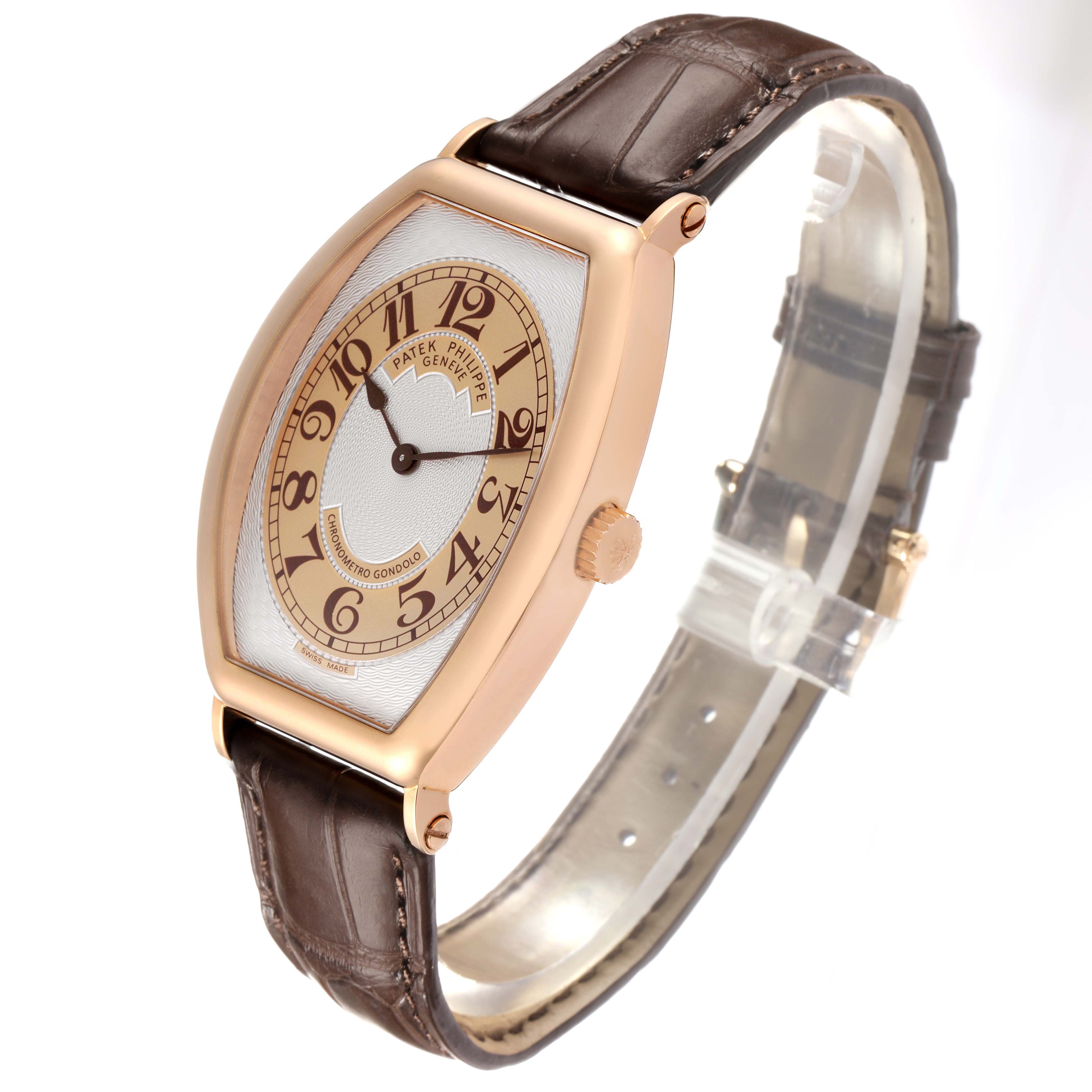 The Patek Philippe Gondolo 5098R Men's Rose Gold Silver Dial watch is shown at a three-quarter angle, highlighting the dial, case, crown, and leather strap.