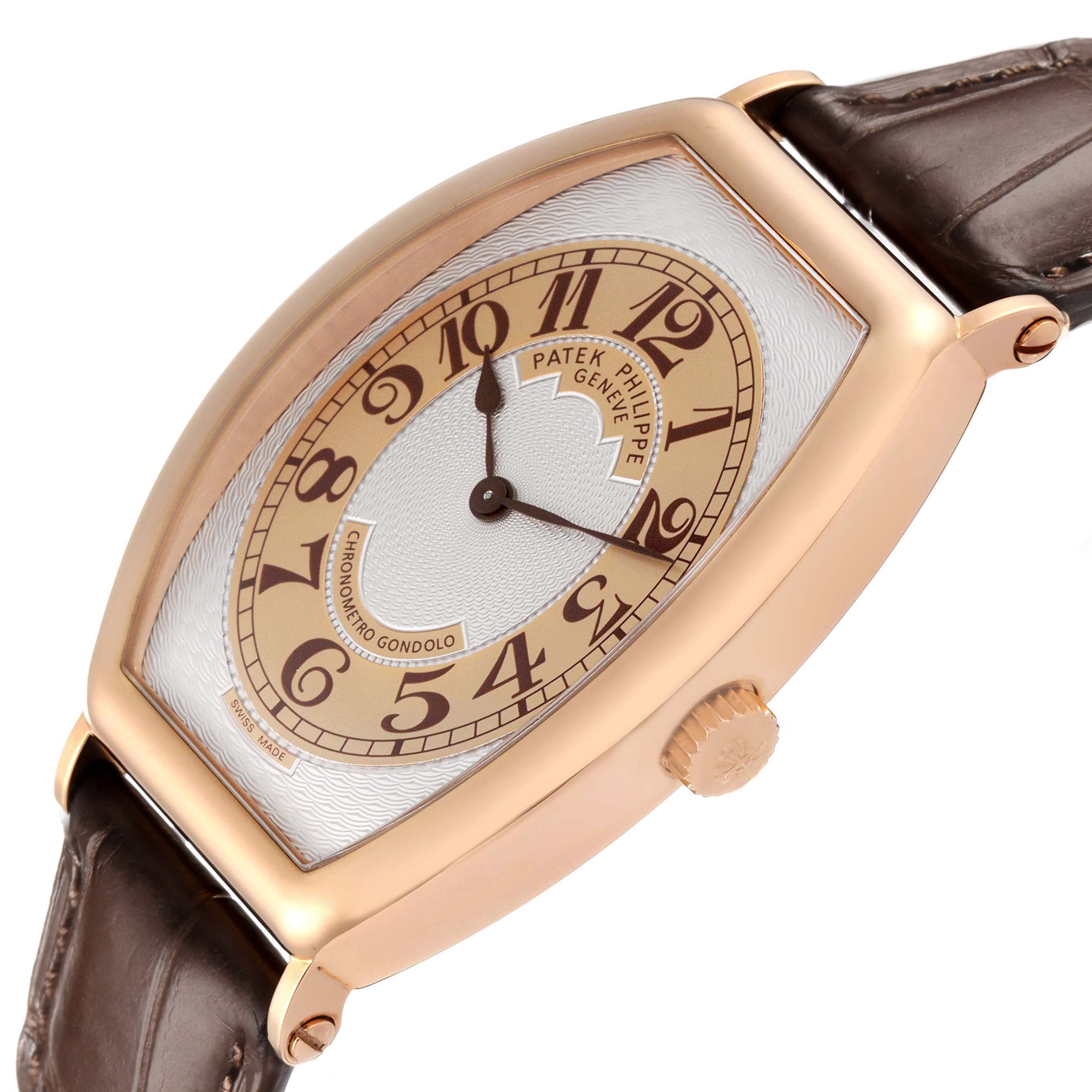 The Patek Philippe Gondolo 5098R Men's Rose Gold Silver Dial watch is shown at a tilted angle, highlighting the case, dial, crown, and leather strap.