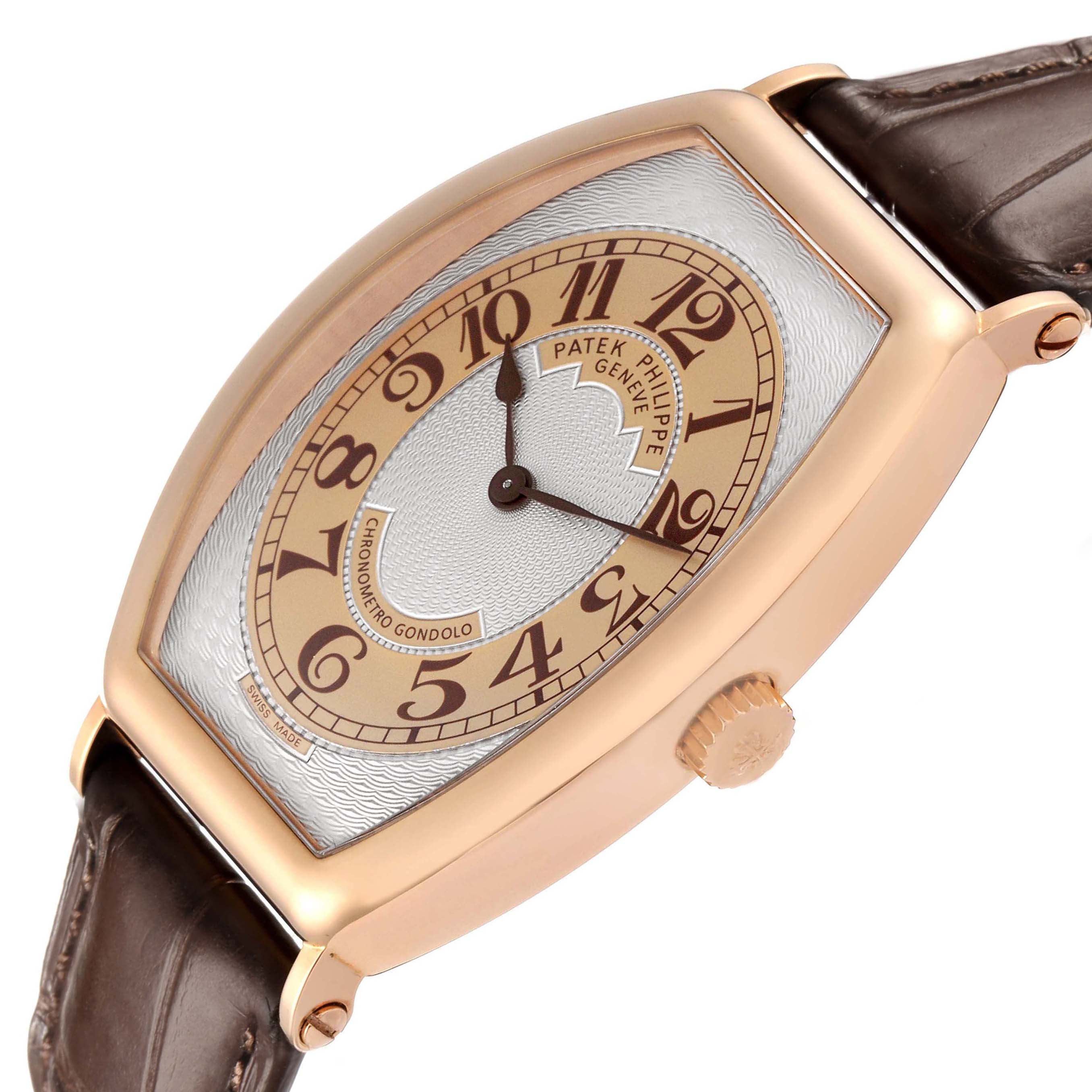 The Patek Philippe Gondolo 5098R Men's Rose Gold Silver Dial watch is shown at a tilted angle highlighting the case, dial, and crown with a brown leather strap.
