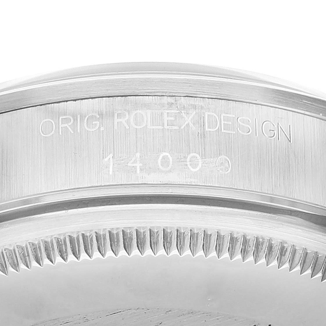 This image shows a close-up of the watch case back for the Rolex Air-King 14000 Men's Stainless Steel Blue Dial 14000 Men's Stainless Steel Blue Dial, with the engraving "ORIG. ROLEX DESIGN 14000."