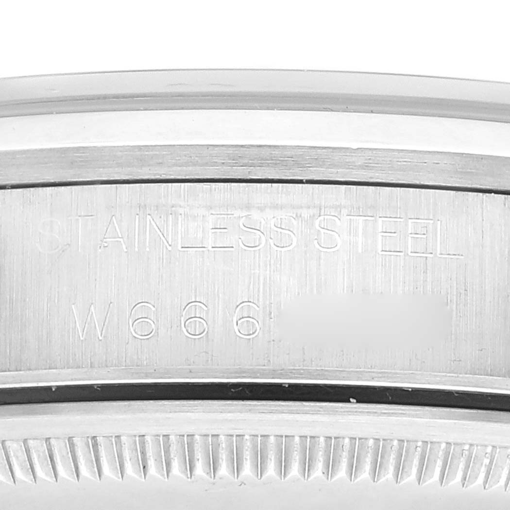 This close-up image shows the side of a Rolex Air-King 14000 Men's Stainless Steel Blue Dial 14000 Men's Stainless Steel Blue Dial watch case, highlighting its stainless steel material and part of the serial number.