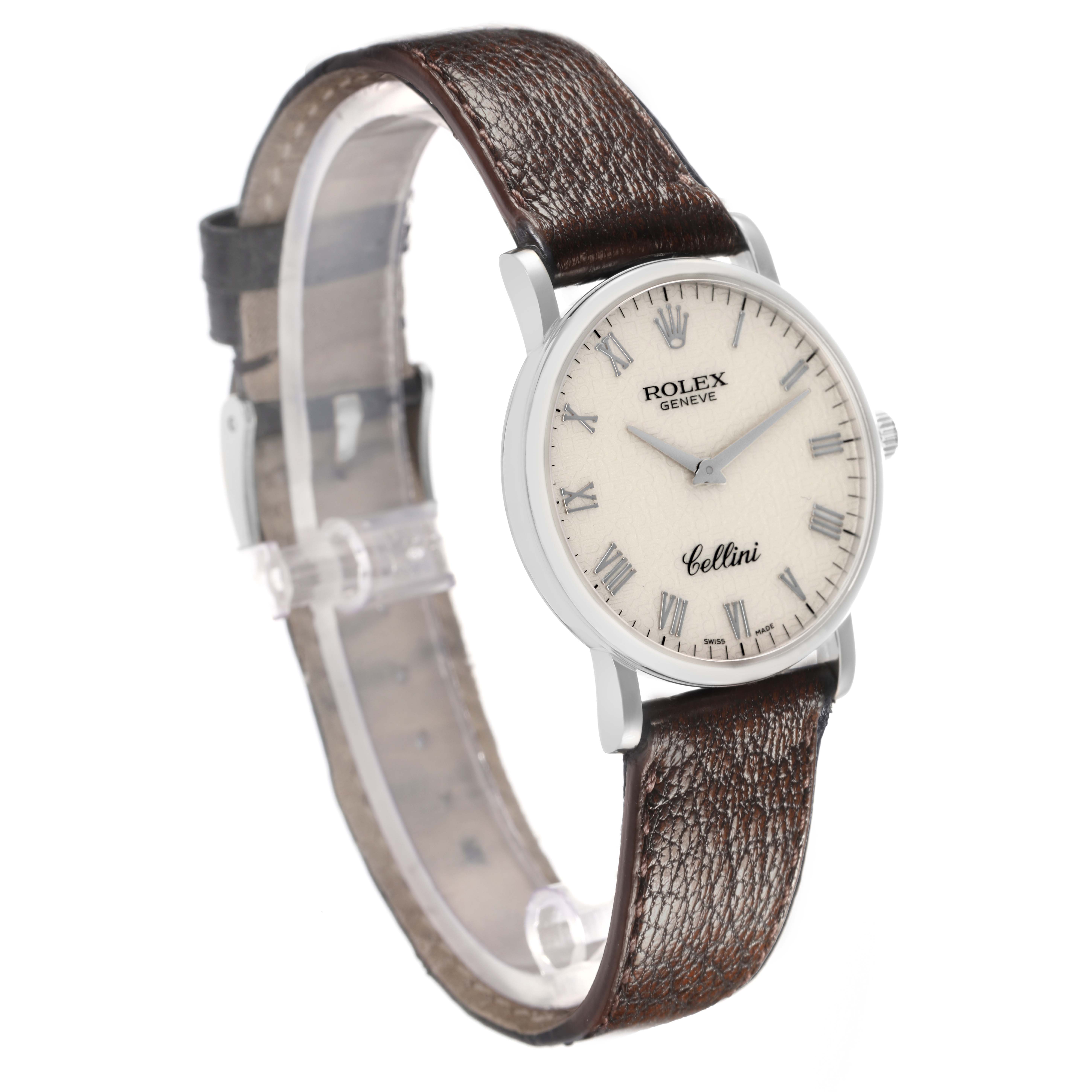 The Rolex Cellini 5115 Men
s White Gold Silver Dial watch is shown at a three-quarter angle, highlighting the face, leather strap, and side profile.