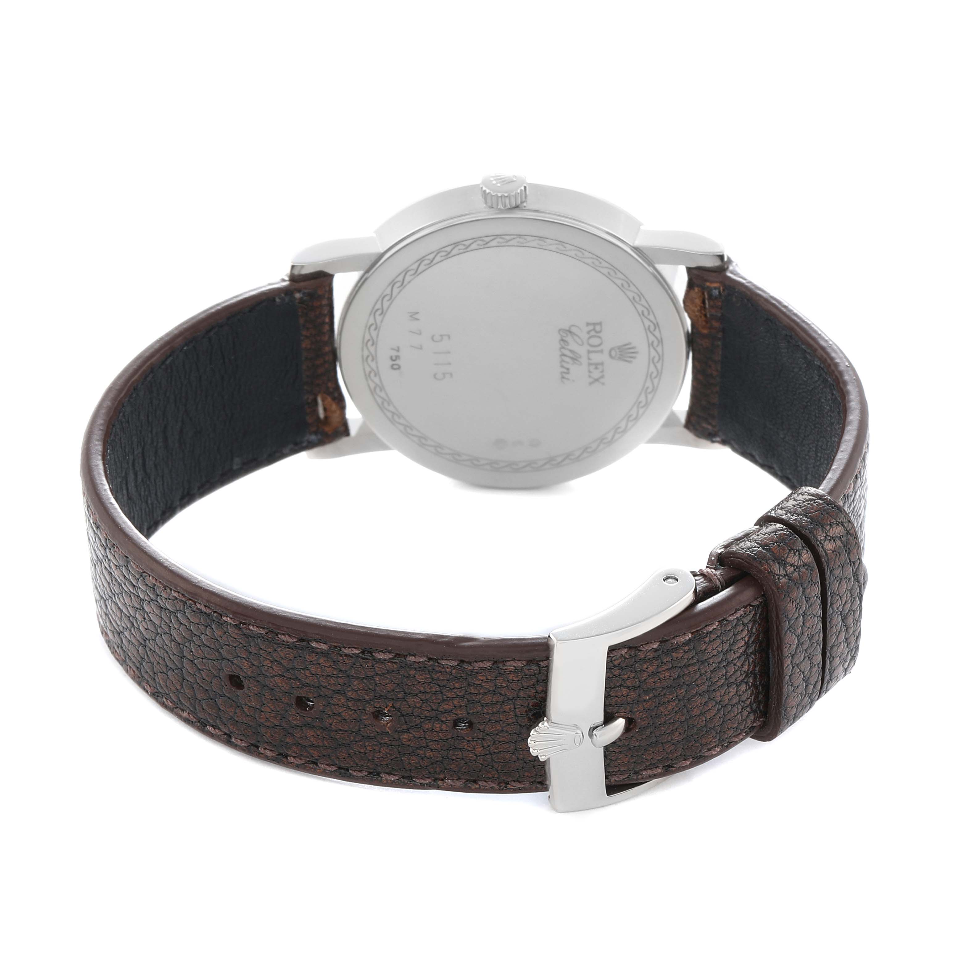 The Rolex Cellini 5115 Men
s White Gold Silver Dial watch is shown from the back, featuring the case back, crown, and leather strap with a buckle.