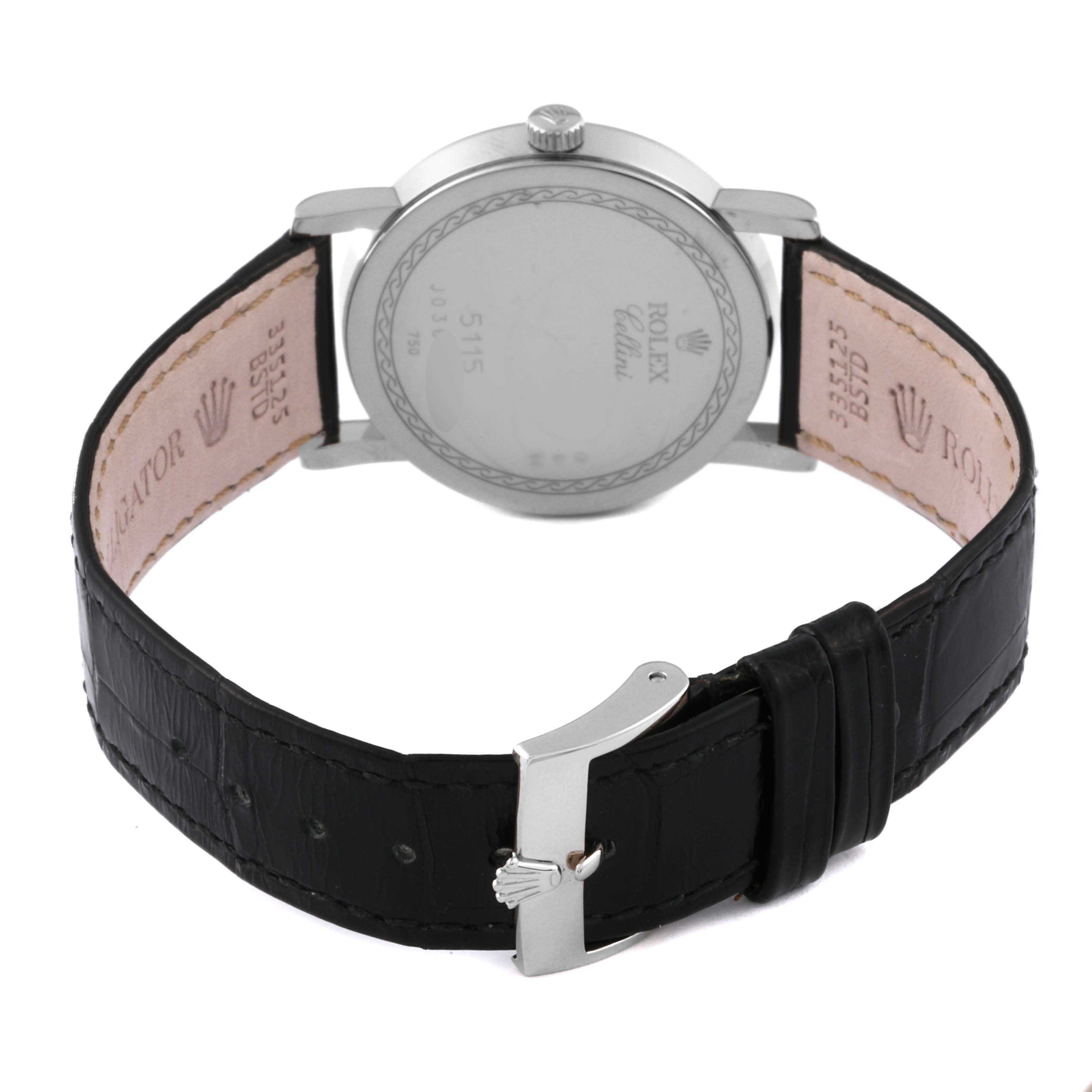 The Rolex Cellini 5115 Men's White Gold Mother of Pearl Dial 5115 Men's White Gold Mother of Pearl Dial watch is shown from the back, displaying the case back, leather strap, and clasp.