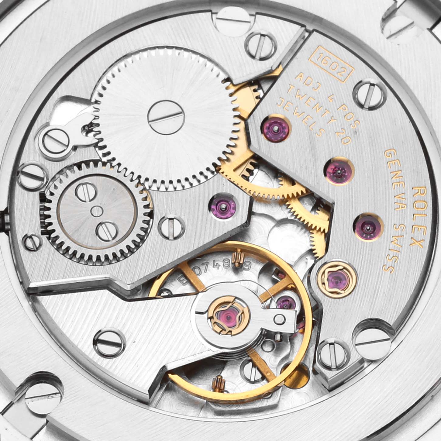 This image shows the intricate internal mechanism of a Rolex Cellini 5115 Men's White Gold Mother of Pearl Dial 5115 Men's White Gold Mother of Pearl Dial watch from a top-down angle.