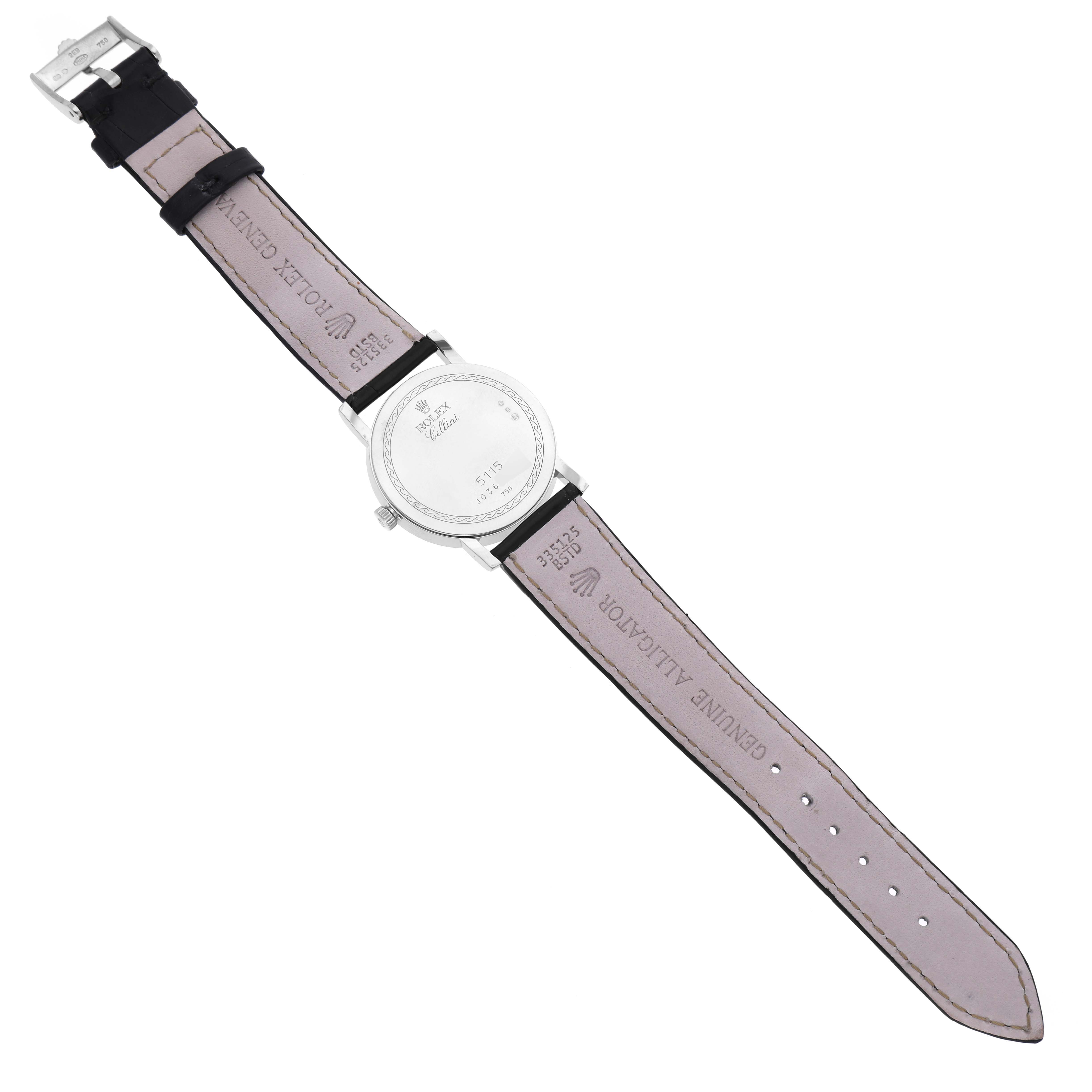 The image shows the back of the Rolex Cellini 5115 Men's White Gold Mother of Pearl Dial 5115 Men's White Gold Mother of Pearl Dial watch, including the case back and the leather strap with markings.