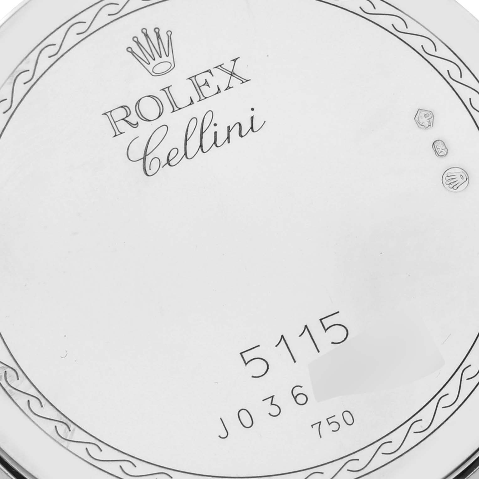 The image shows the back case engraving of a Rolex Cellini 5115 Men's White Gold Mother of Pearl Dial 5115 Men's White Gold Mother of Pearl Dial watch, displaying the brand, model name, and serial numbers.