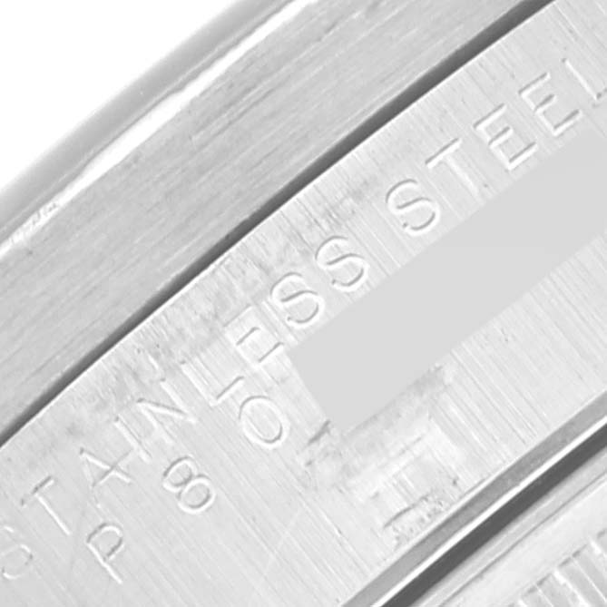 The image shows a close-up of the stainless steel part of a Rolex Date 15210 Men's Stainless Steel Blue Dial 15210 Men's Stainless Steel Blue Dial watch's clasp or band.