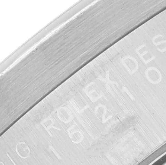This shows a close-up of the engraving on the side of the Rolex Date 15210 Men's Stainless Steel Blue Dial 15210 Men's Stainless Steel Blue Dial model watch case.