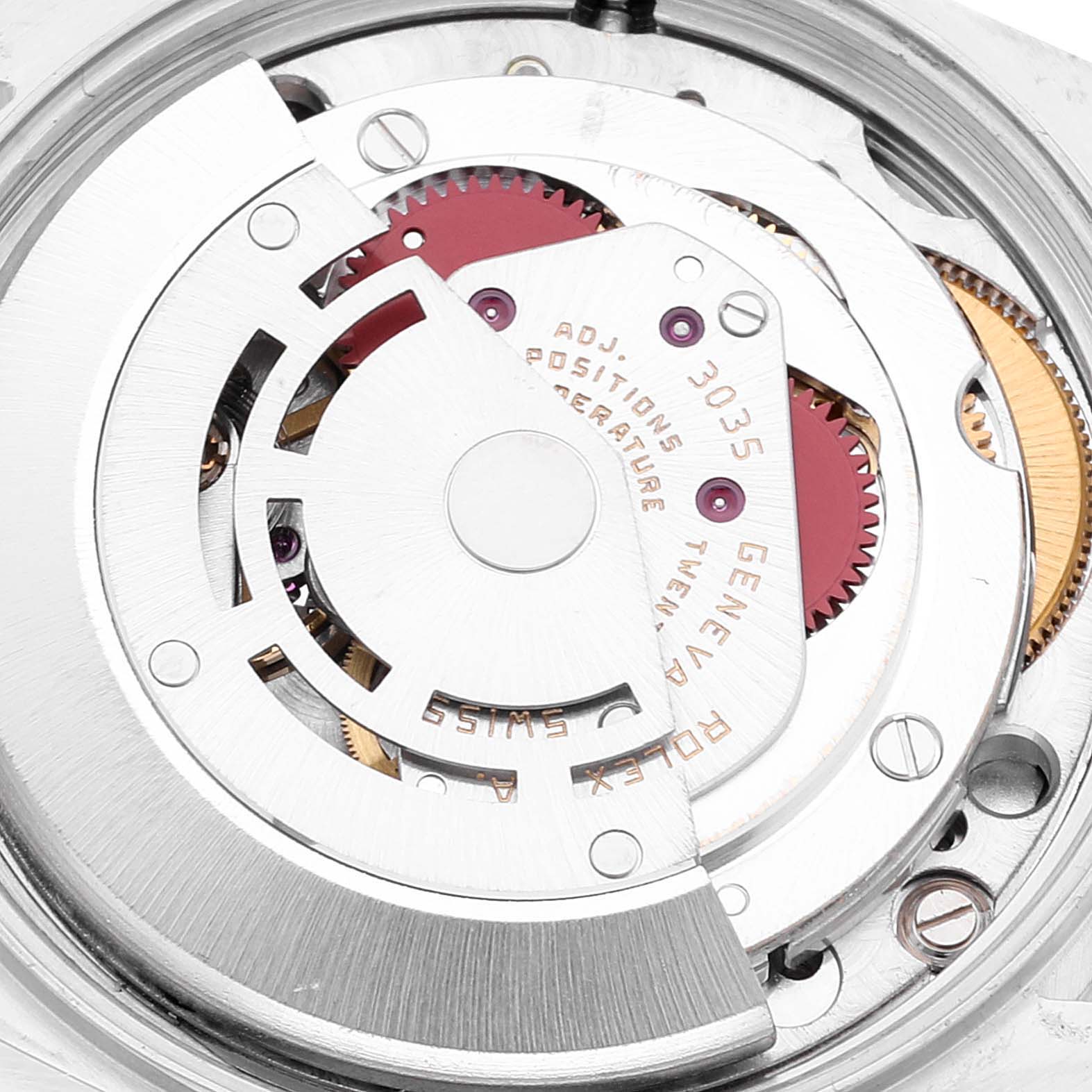 The image shows the internal mechanism of a Vintage Collection model by Rolex from a top-down angle.