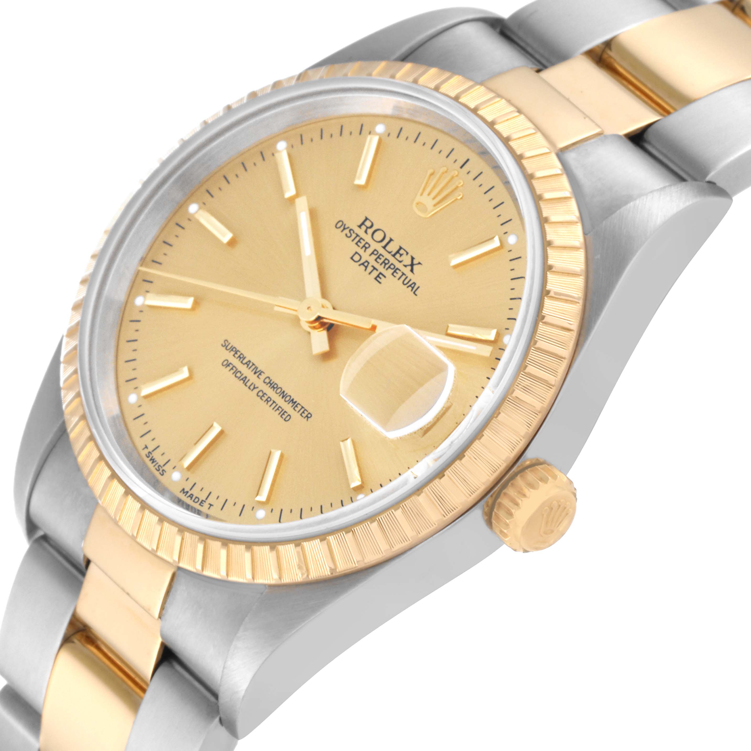 The image shows a close-up angled view of the Rolex Date 15223 Men's Steel and Gold (two tone) Champagne Dial 15223 Men's Steel and Gold (two tone) Champagne Dial model watch, displaying its dial, fluted bezel, and part of the bracelet.