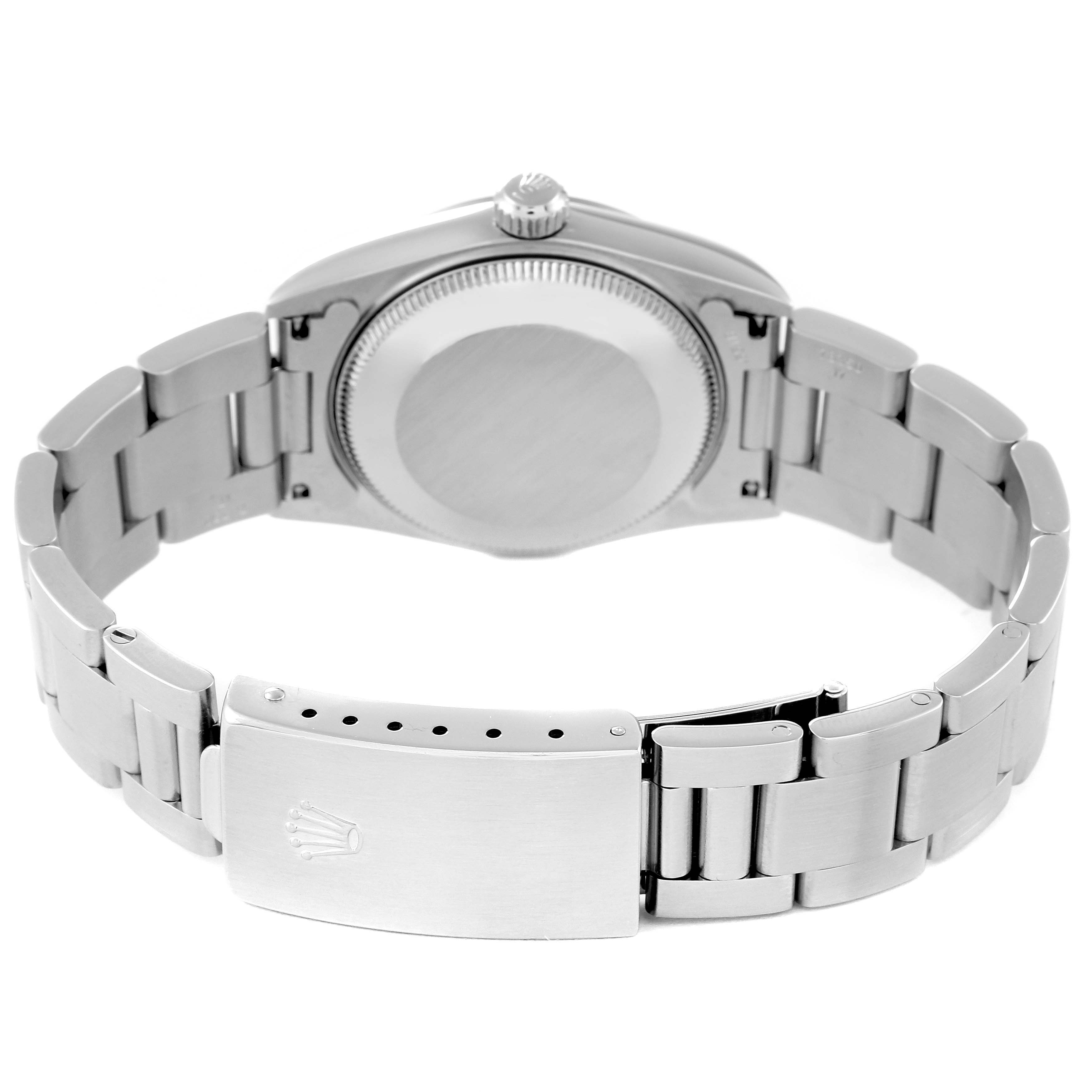 This image shows the backside of a Rolex Mid-Size 78240 Women
s Stainless Steel Silver Dial 78240 Women
s Stainless Steel Silver Dial model watch, highlighting its case back, bracelet, and clasp.