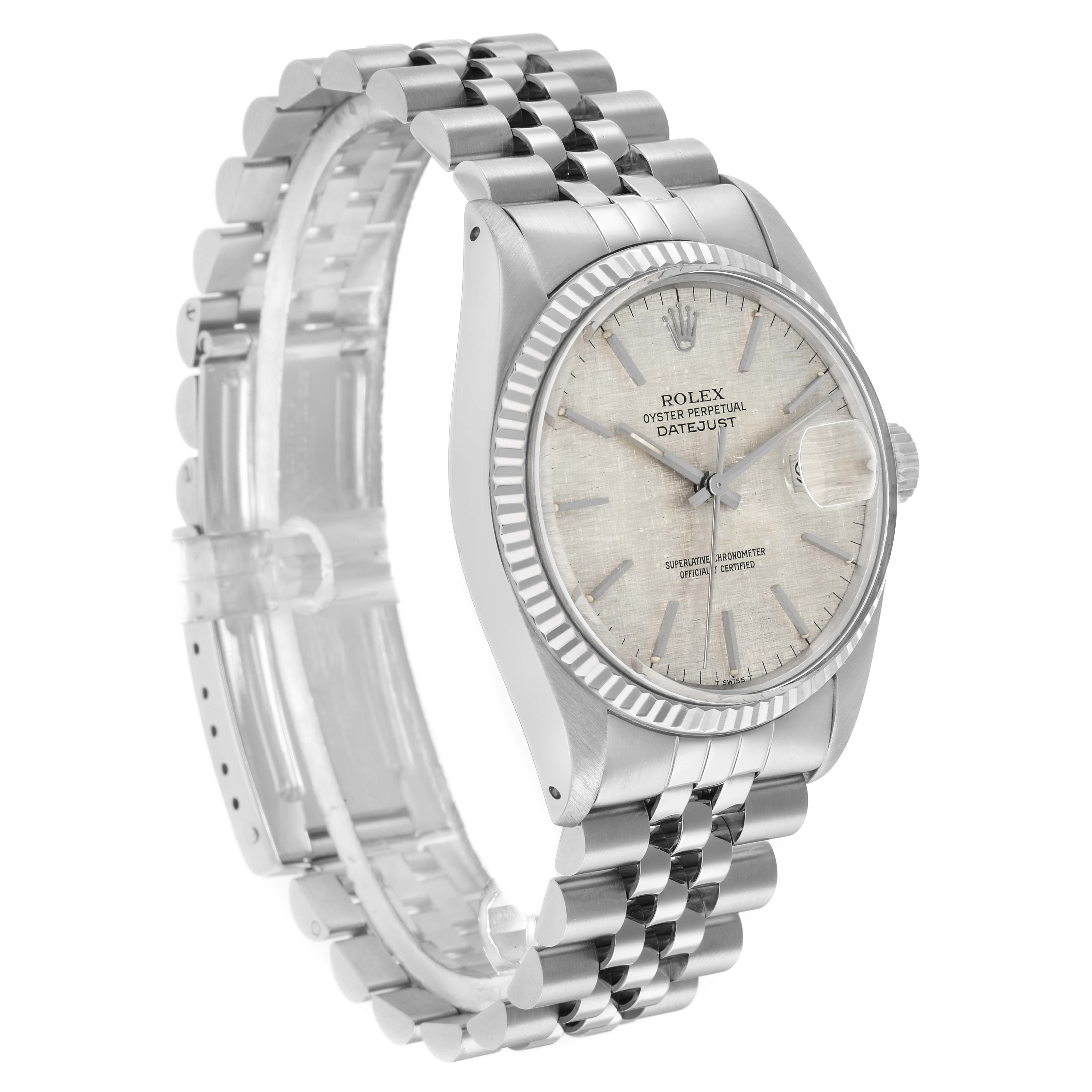 The Rolex Datejust 16014 Men
s Stainless Steel Silver Dial watch is shown at a front-side angle, highlighting the face, fluted bezel, and Jubilee bracelet.
