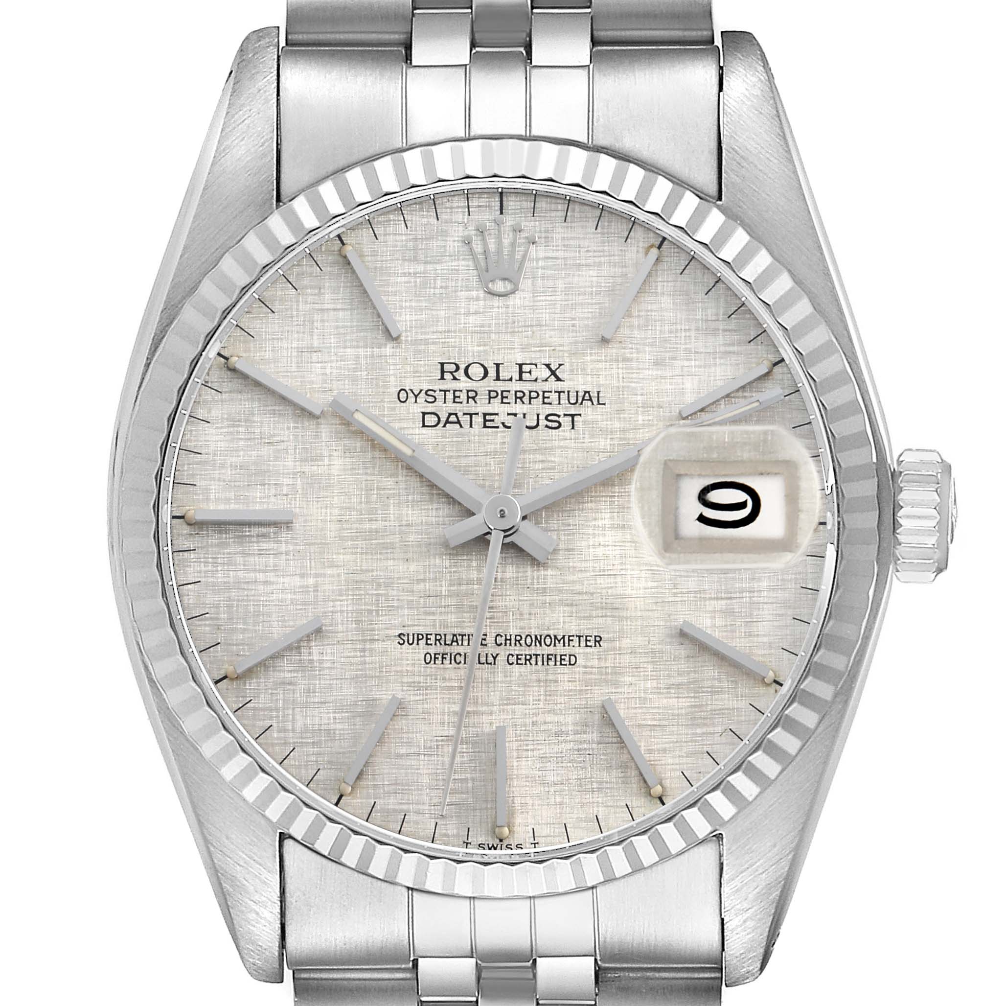 The Rolex Datejust 16014 Men
s Stainless Steel Silver Dial watch is shown from the front, displaying the dial, hands, fluted bezel, and part of the bracelet.