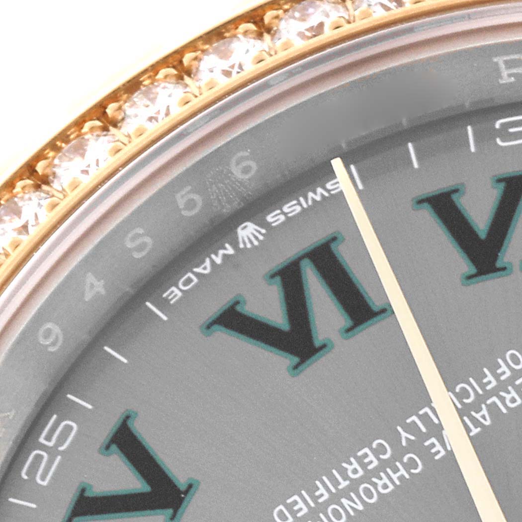 This image shows a partial close-up of the dial and diamond-studded bezel of a Rolex Datejust 126283 Men's Steel and Gold (two tone) Grey Dial 126283 Men's Steel and Gold (two tone) Grey Dial watch.