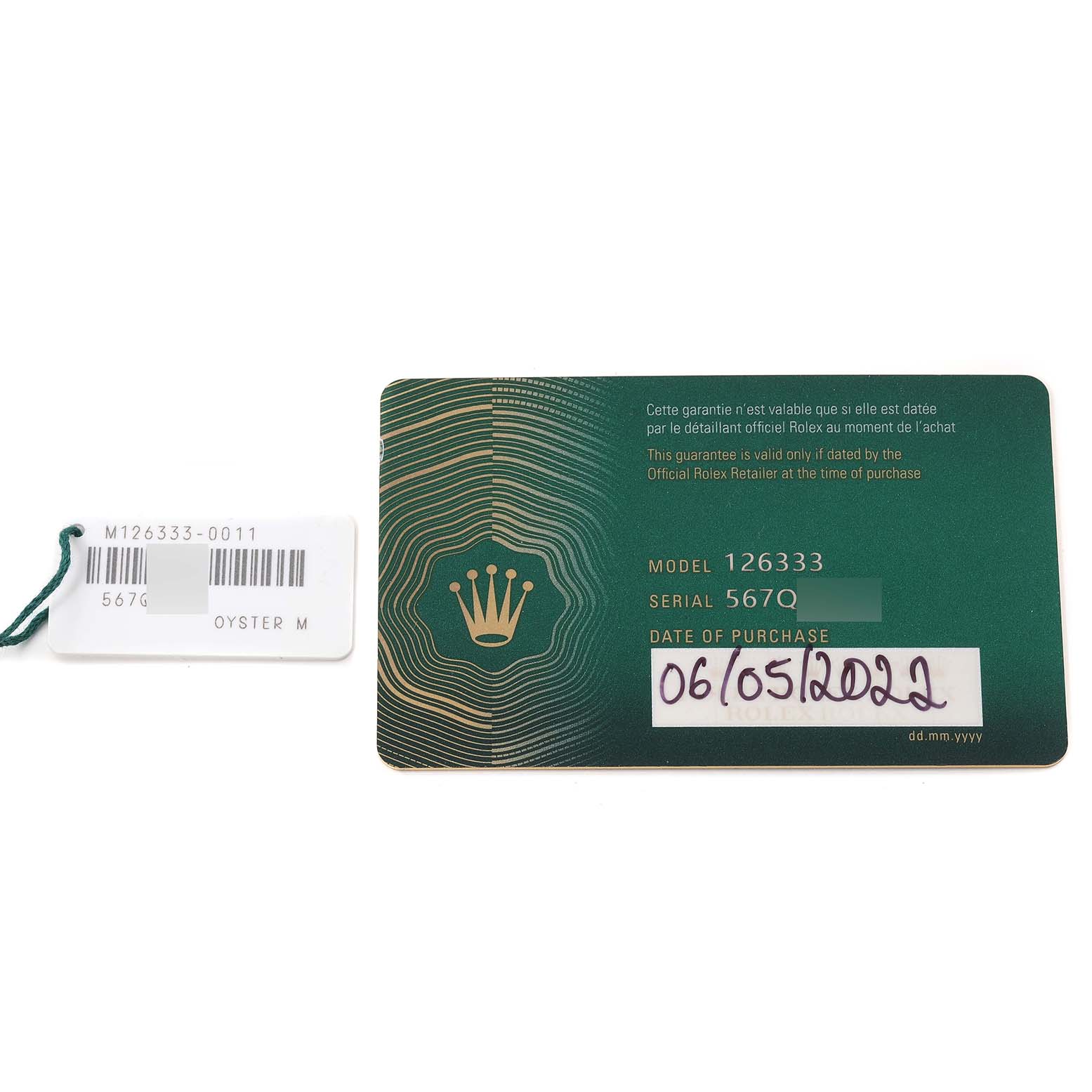 This image shows the model, serial number, and purchase date card for a Rolex Datejust 41 126333 Men's Steel and Gold (two tone) Champagne Dial 126333 Men's Steel and Gold (two tone) Champagne Dial, alongside a tag with barcode information.
