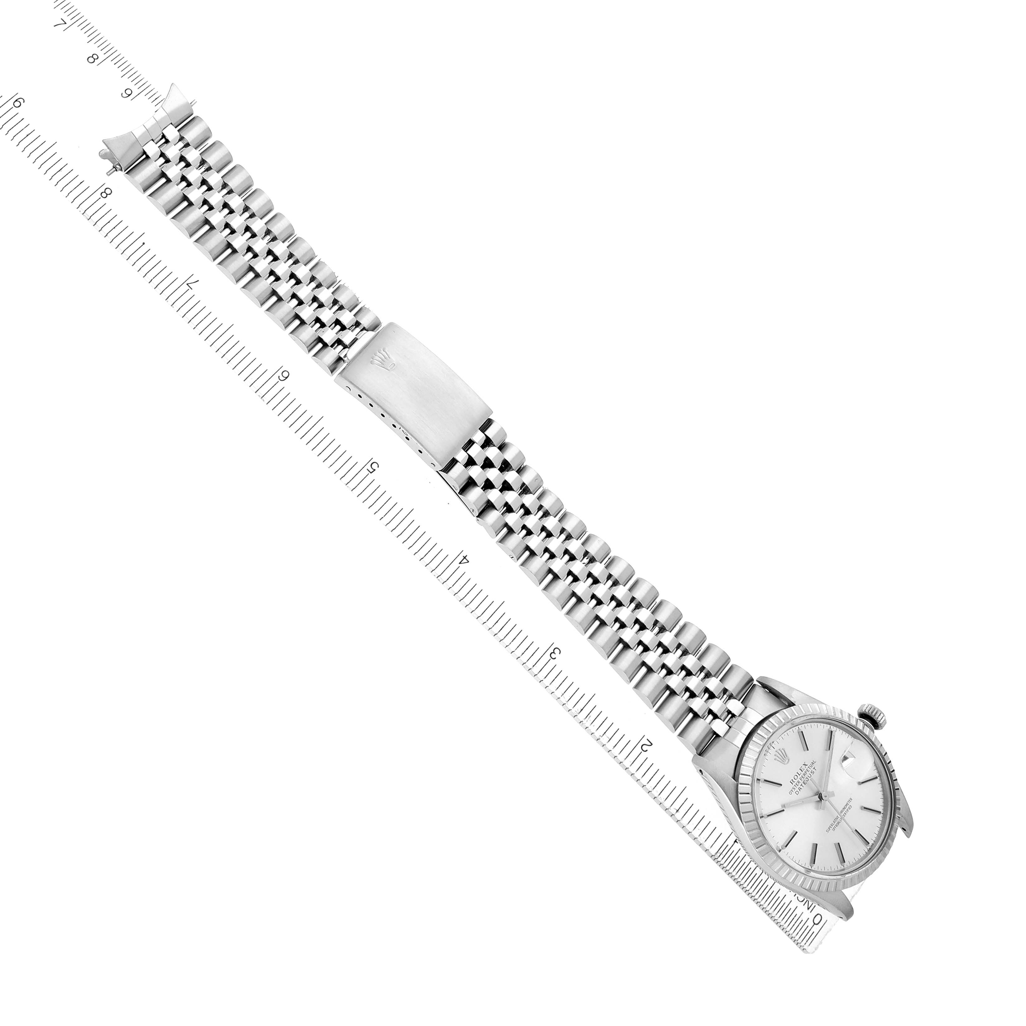 The Rolex Vintage Collection 16030 Men
s Stainless Steel Silver Dial watch is shown from a top view, highlighting the face, bezel, and metal bracelet alongside a ruler.