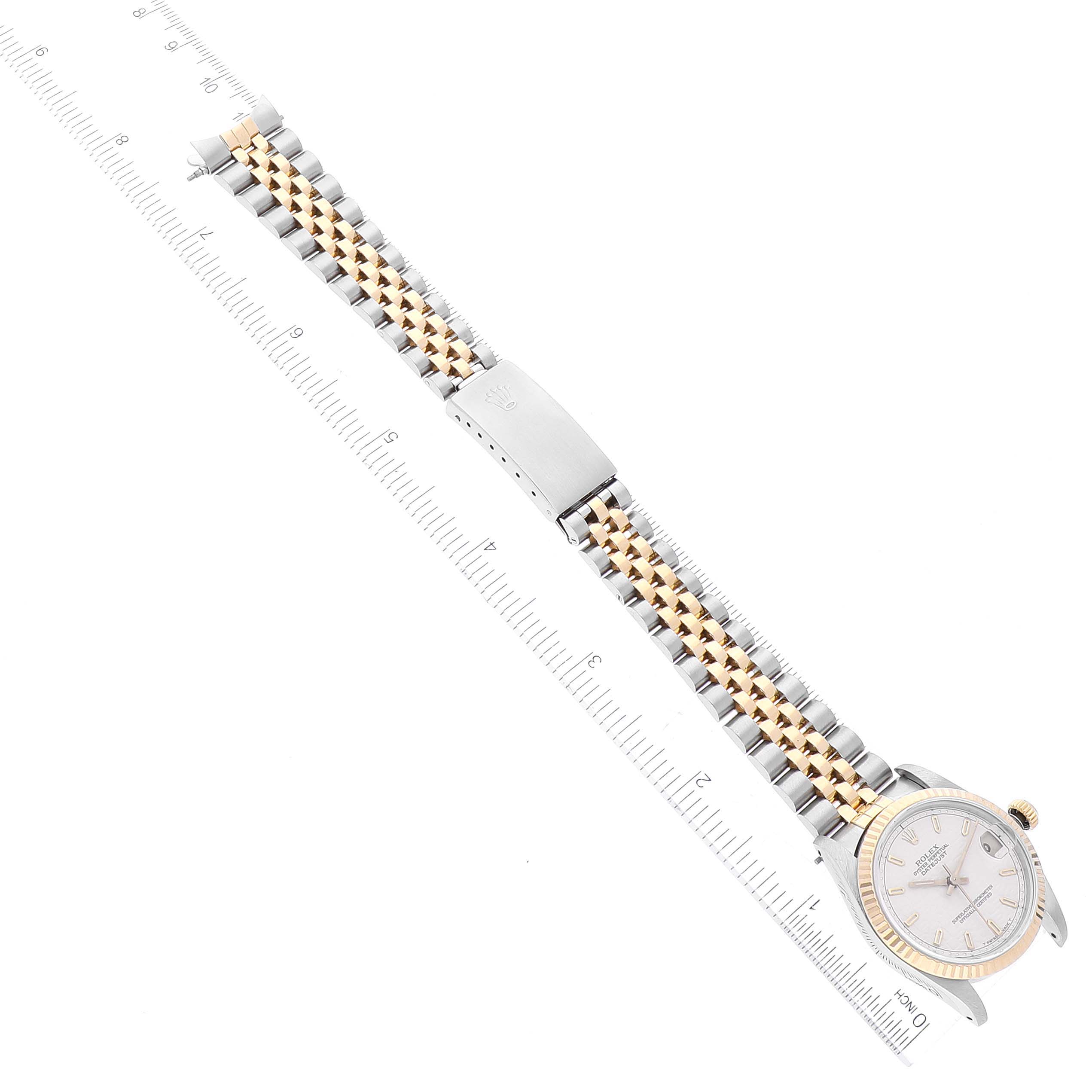 The image shows a top-down view of a Rolex Mid-Size 68273 Women's Steel and Gold (two tone) Beige Dial 68273 Women's Steel and Gold (two tone) Beige Dial model, highlighting the dial, bezel, and two-tone bracelet with clasp.