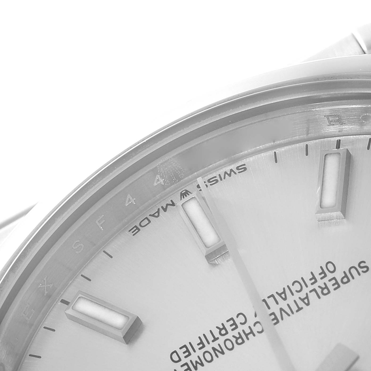 The close-up angle shows the dial, part of the bezel, and hour markers of the Mid-Size Rolex watch.