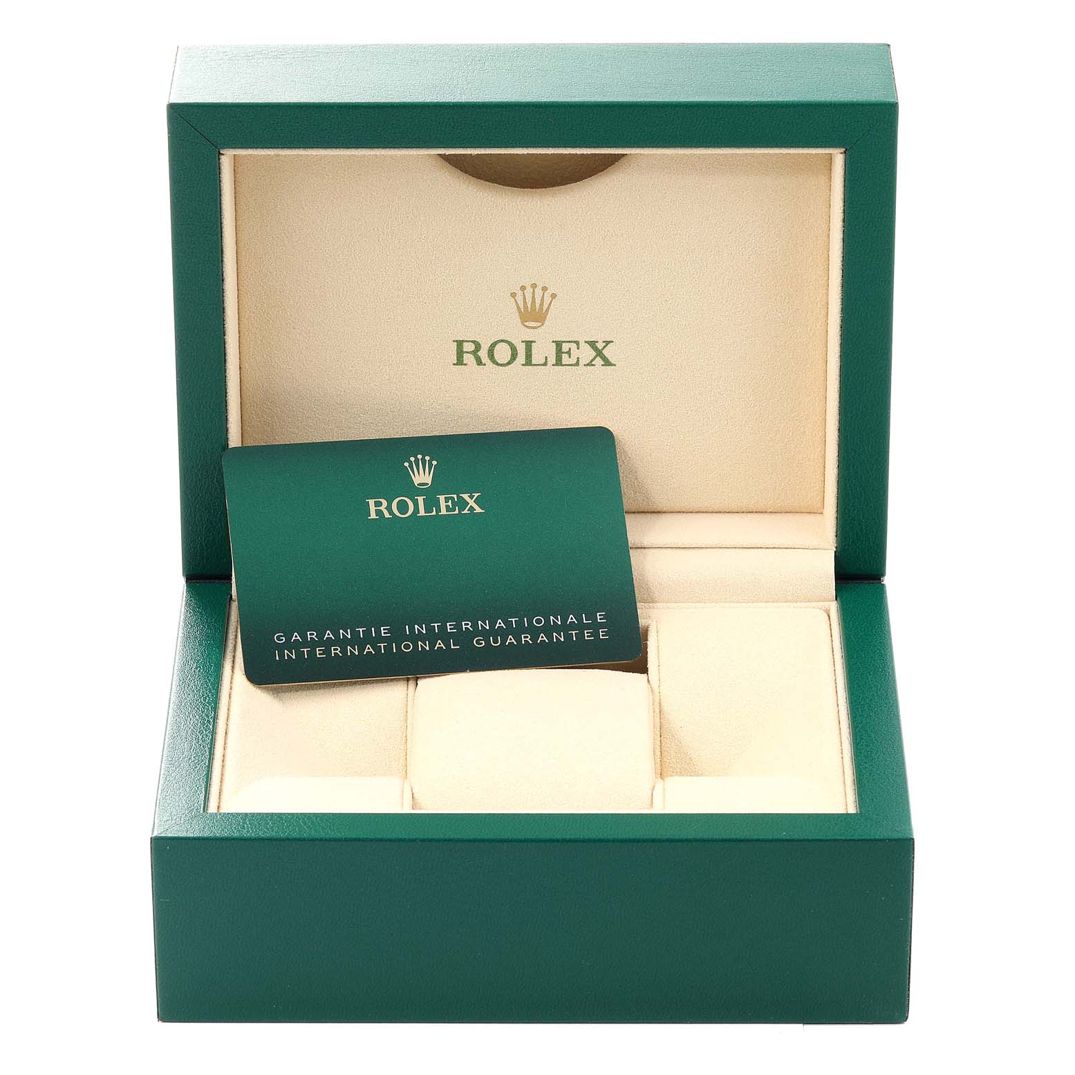 This image shows an open green and beige box for a Mid-Size Rolex watch, along with an international guarantee card.