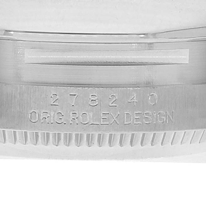 The image shows the engraved side of the bezel on a Rolex Mid-Size 278240 Women's Stainless Steel Silver Dial 278240 Women's Stainless Steel Silver Dial watch, highlighting the serial number and "ORIG. ROLEX DESIGN."