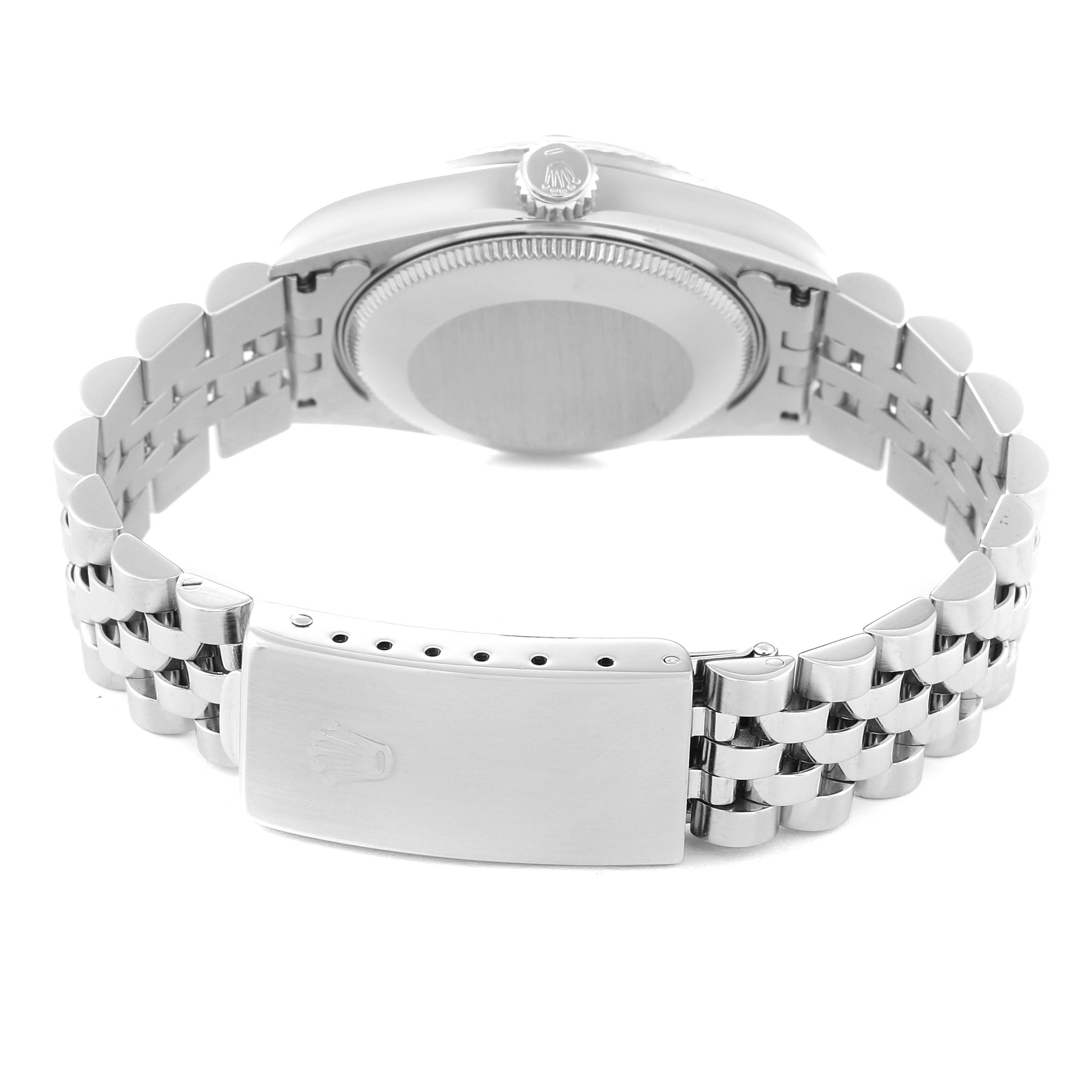 This image shows the back and partial side view of a Mid-Size Rolex watch, highlighting its bracelet and clasp.