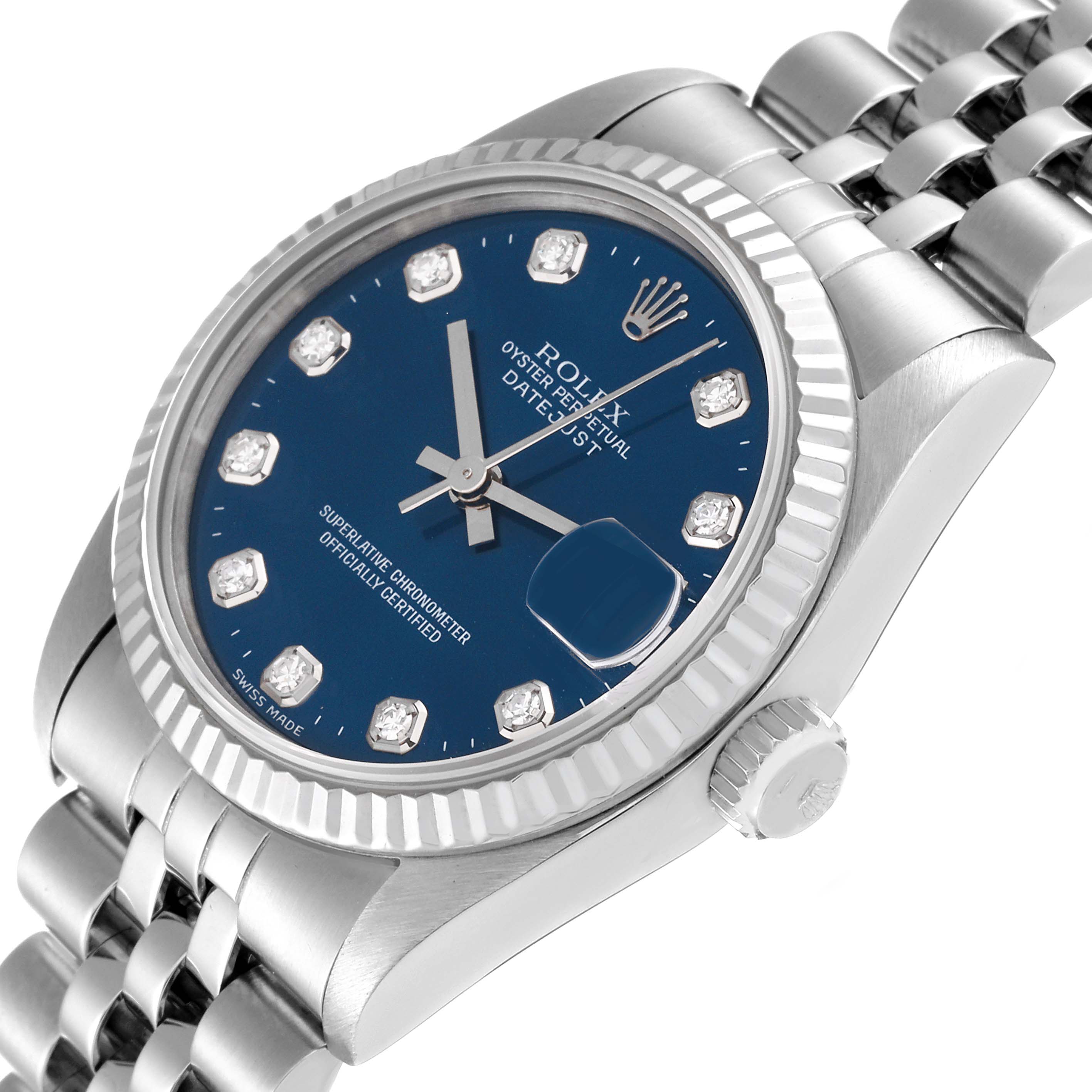 This image shows a Rolex Mid-Size 68274 Women
s Stainless Steel Blue Dial 68274 Women
s Stainless Steel Blue Dial Datejust watch at a slight angle, highlighting its blue dial, date window, and stainless steel bracelet.