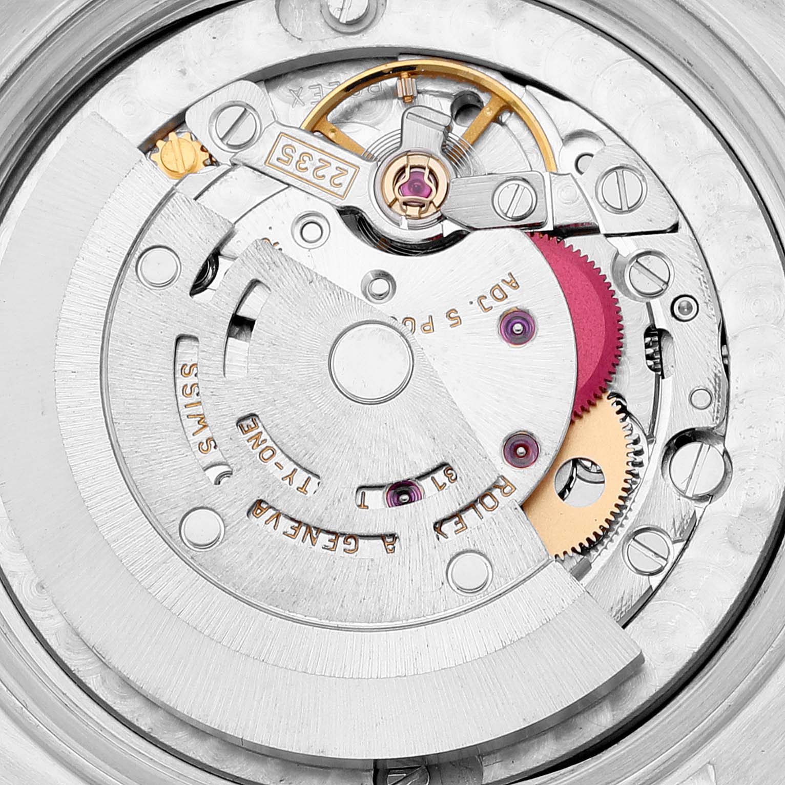 The image shows an angled close-up of the movement mechanism in the exterior casing of a Mid-Size Rolex watch.