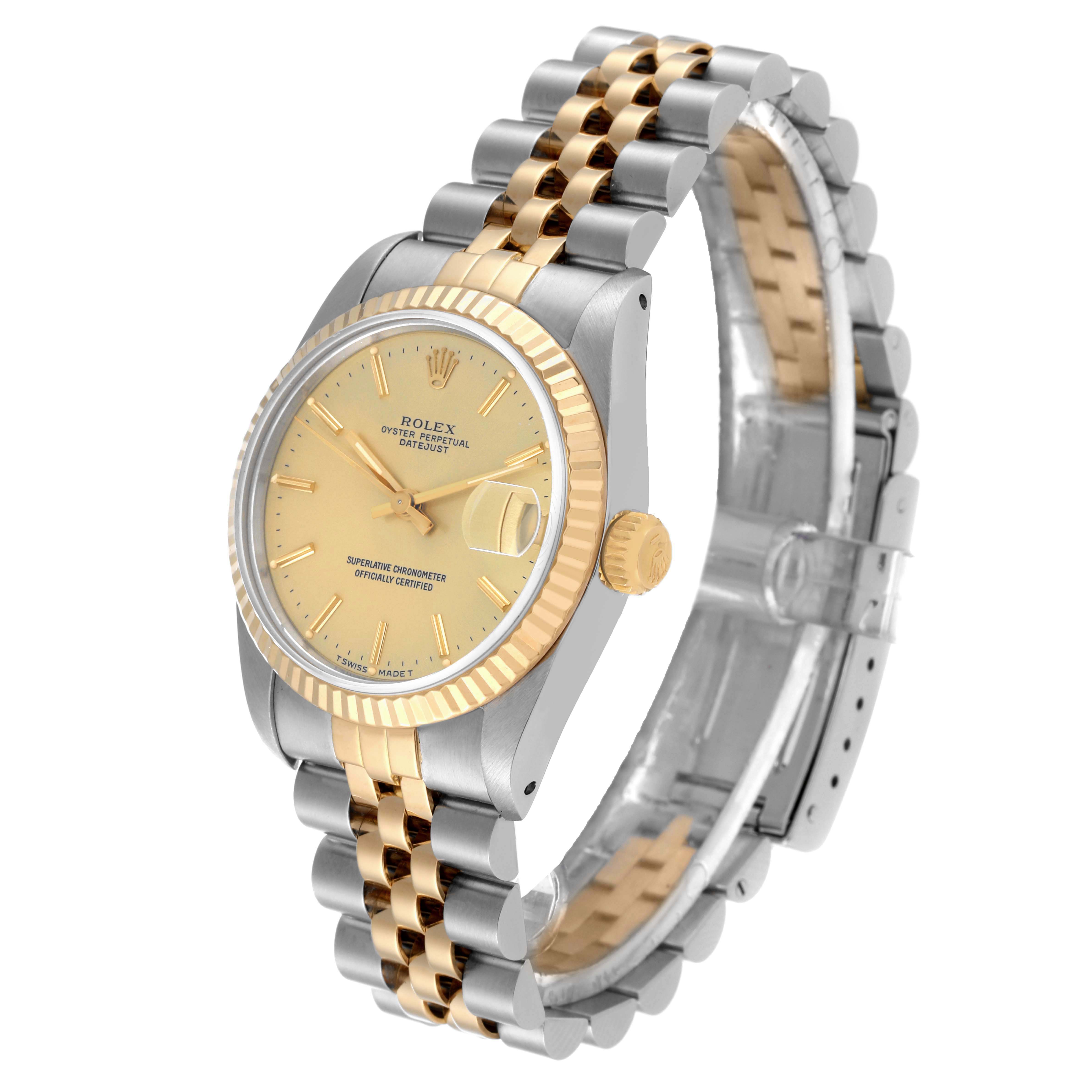 This image shows a side and front angle of a Rolex Mid-Size 68273 Women's Steel and Gold (two tone) Champagne Dial 68273 Women's Steel and Gold (two tone) Champagne Dial model watch, highlighting its dial, bezel, crown, and two-tone bracelet.