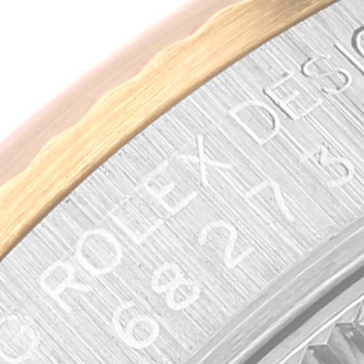The image shows a close-up of the engraved caseback of a Rolex Mid-Size 68273 Women's Steel and Gold (two tone) Champagne Dial 68273 Women's Steel and Gold (two tone) Champagne Dial model, highlighting the brand name and design number.