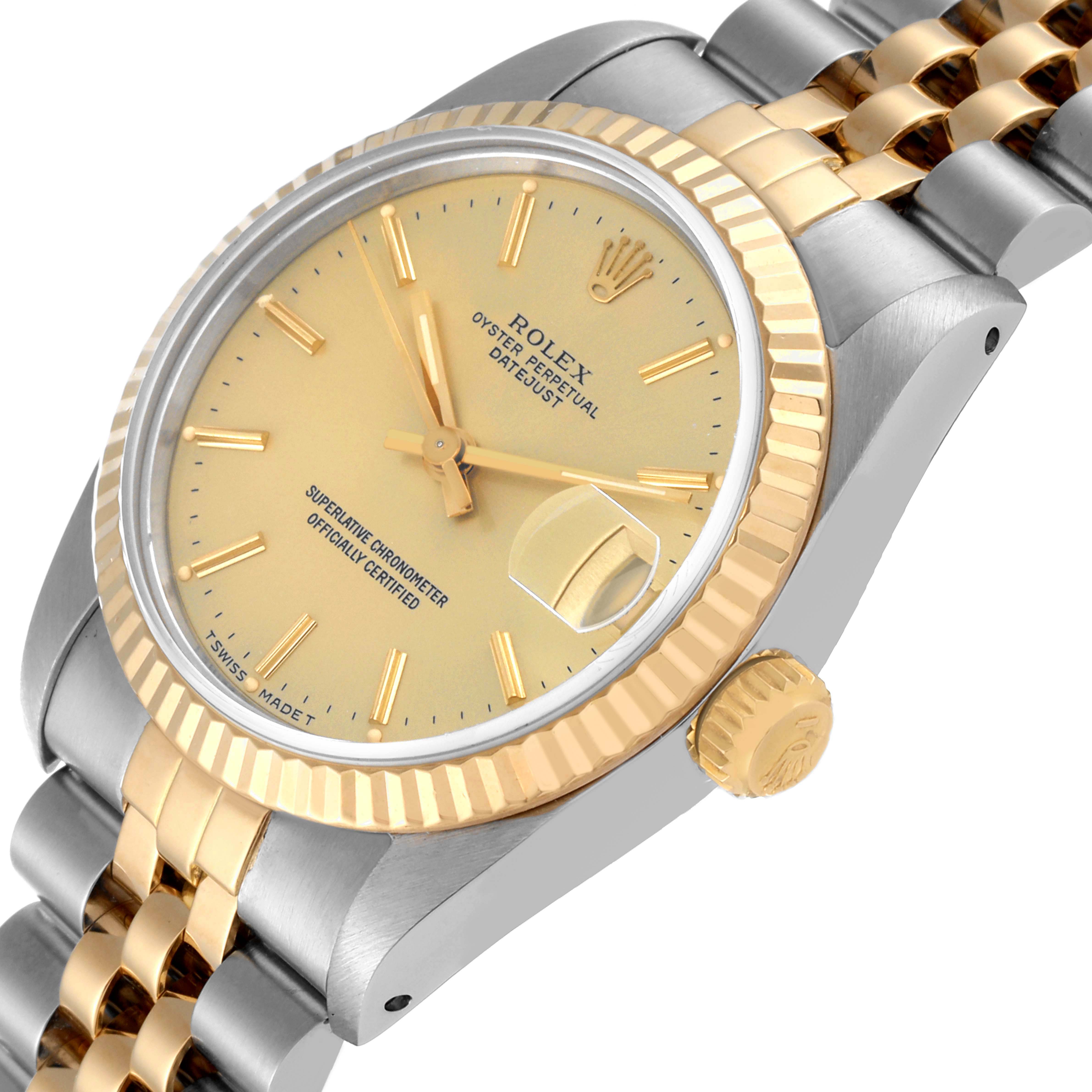 The image shows a Rolex Mid-Size 68273 Women's Steel and Gold (two tone) Champagne Dial 68273 Women's Steel and Gold (two tone) Champagne Dial Oyster Perpetual Datejust watch at an angled close-up, highlighting the dial, crown, and two-tone bracelet.