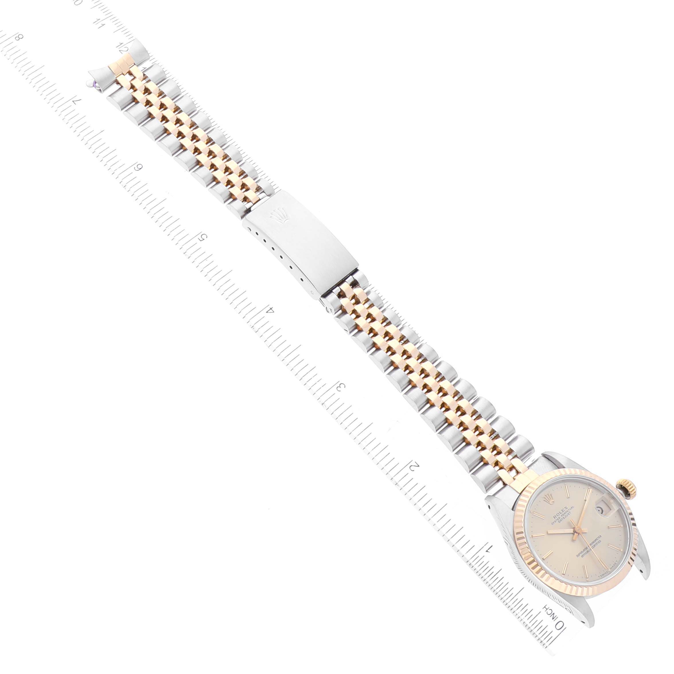 This image shows a Rolex Mid-Size 68273 Women's Steel and Gold (two tone) Champagne Dial 68273 Women's Steel and Gold (two tone) Champagne Dial watch laid flat with the face, bracelet, and clasp visible.