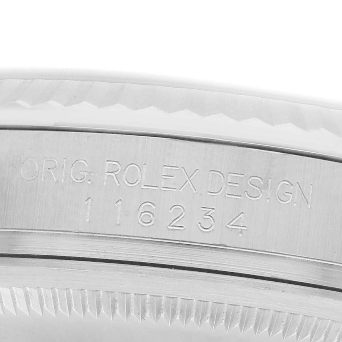 The image shows a close-up of the case side engraving on a Rolex Datejust 16234 Men
s Stainless Steel Black Dial, highlighting the model number and fluted bezel.