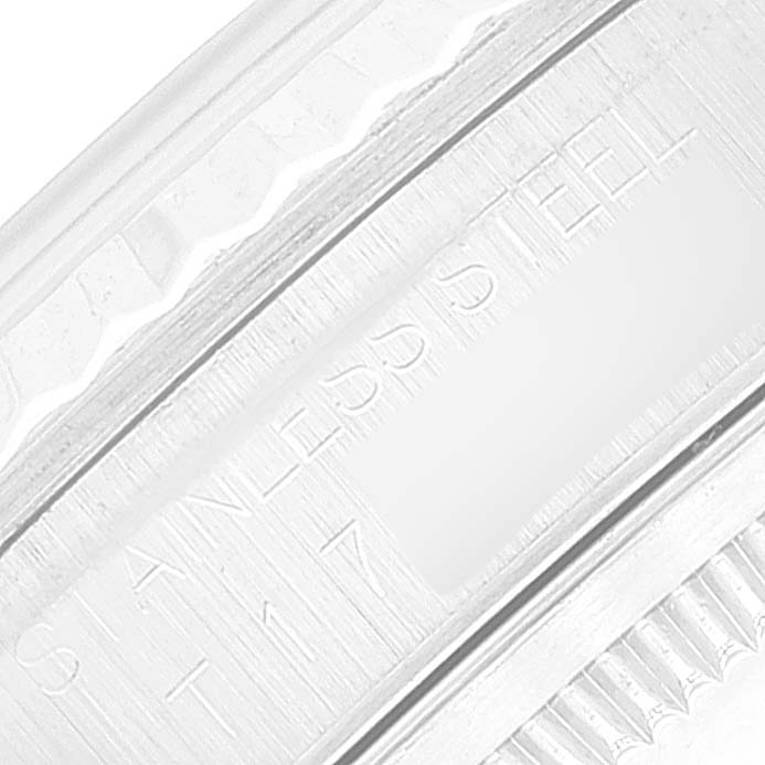The image shows a close-up of the side of the Rolex Datejust 16234 Men's Stainless Steel Silver Dial 16234 Men's Stainless Steel Silver Dial watch case, highlighting the "STAINLESS STEEL" engraving.